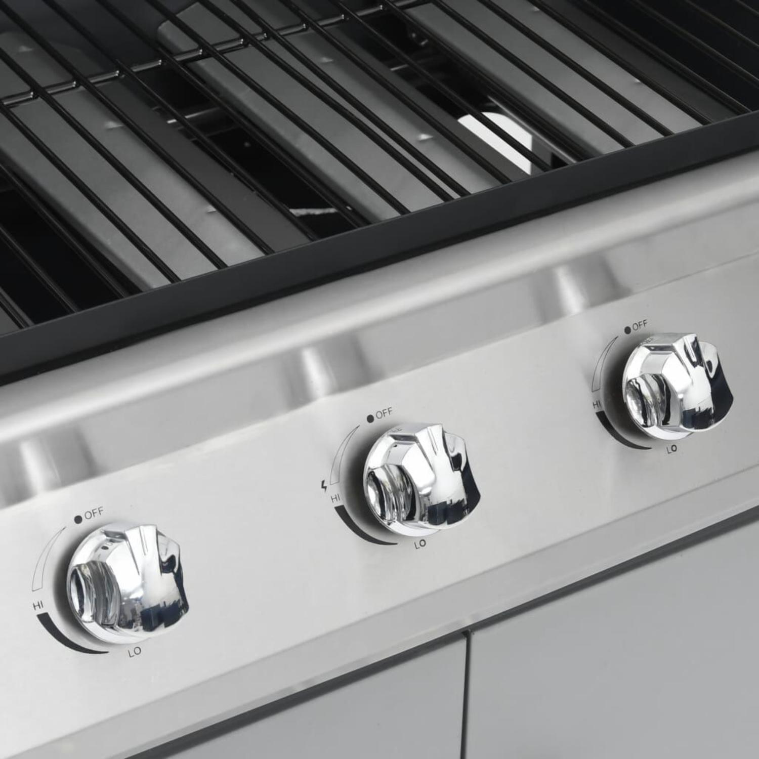 Nahaufnahme der Bedienknöpfe eines Gasgrills, mit Einstellungen für Aus, Hoch und Niedrig, aus glänzendem Metall.