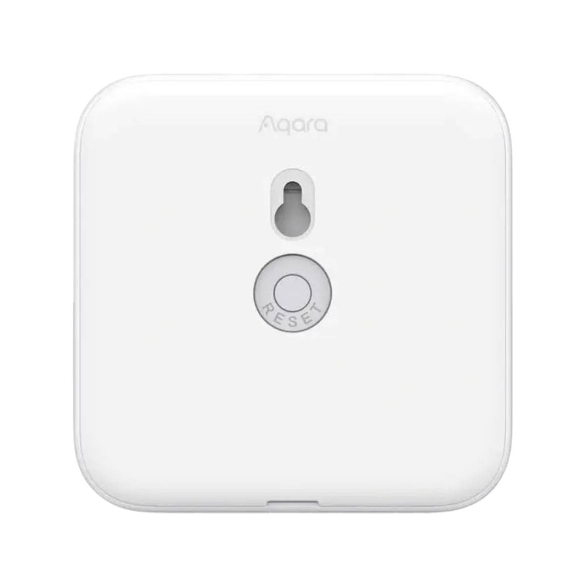 Retro di un dispositivo domestico intelligente Aqara bianco con un pulsante di reset.