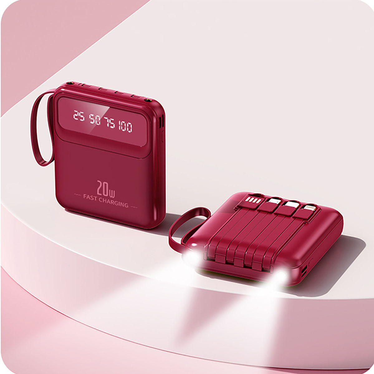 Eine rote Powerbank mit Ladeanzeige und Ladekabel. Das Gerät hat ein glattes, geschwungenes Design.