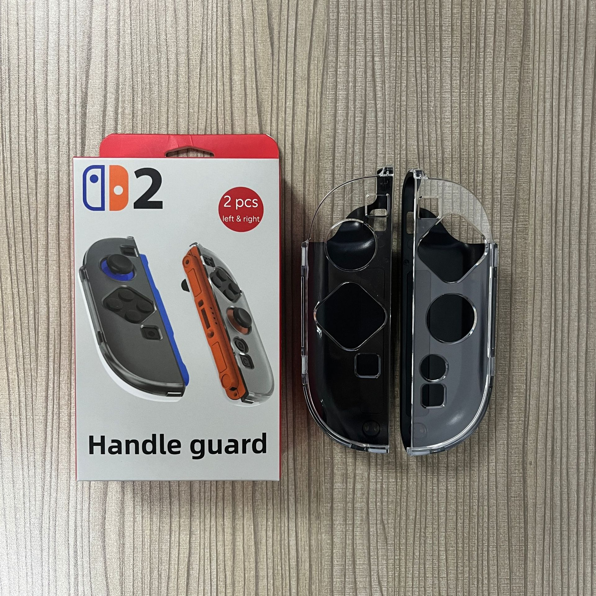 Switch handle guard case. Gray and orange controller design on the package and transparent protective case.