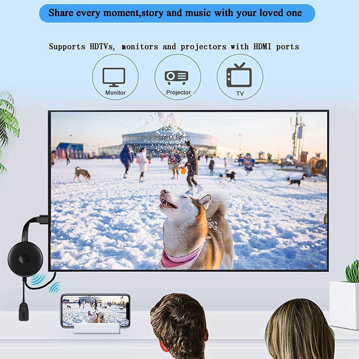 Ein Gerät, das an einen Fernseher angeschlossen ist, zeigt eine schneebedeckte Szene mit einem Hund und zuschauenden Personen.