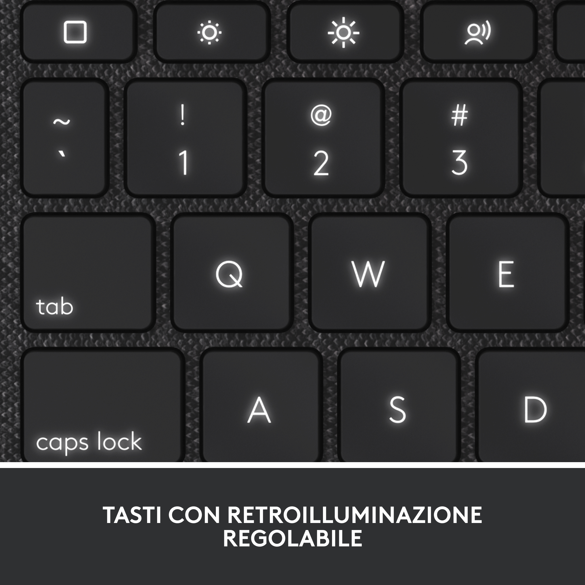 Primer plano de un teclado. Las teclas son negras y hay símbolos. Las teclas tienen retroiluminación ajustable.