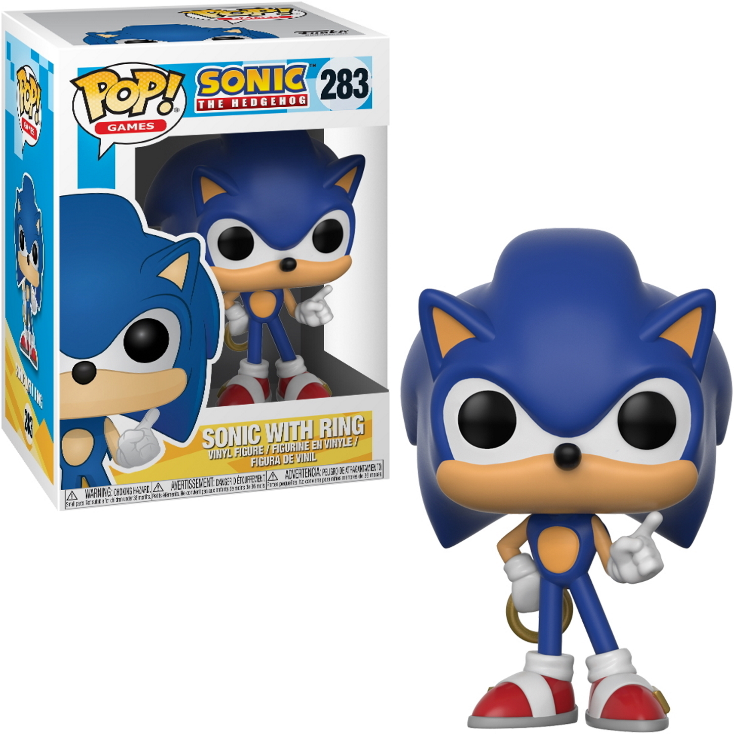 Niebieska figurka Sonica trzymająca pierścień, z pudełkiem po lewej. Sonic ma czerwone buty.