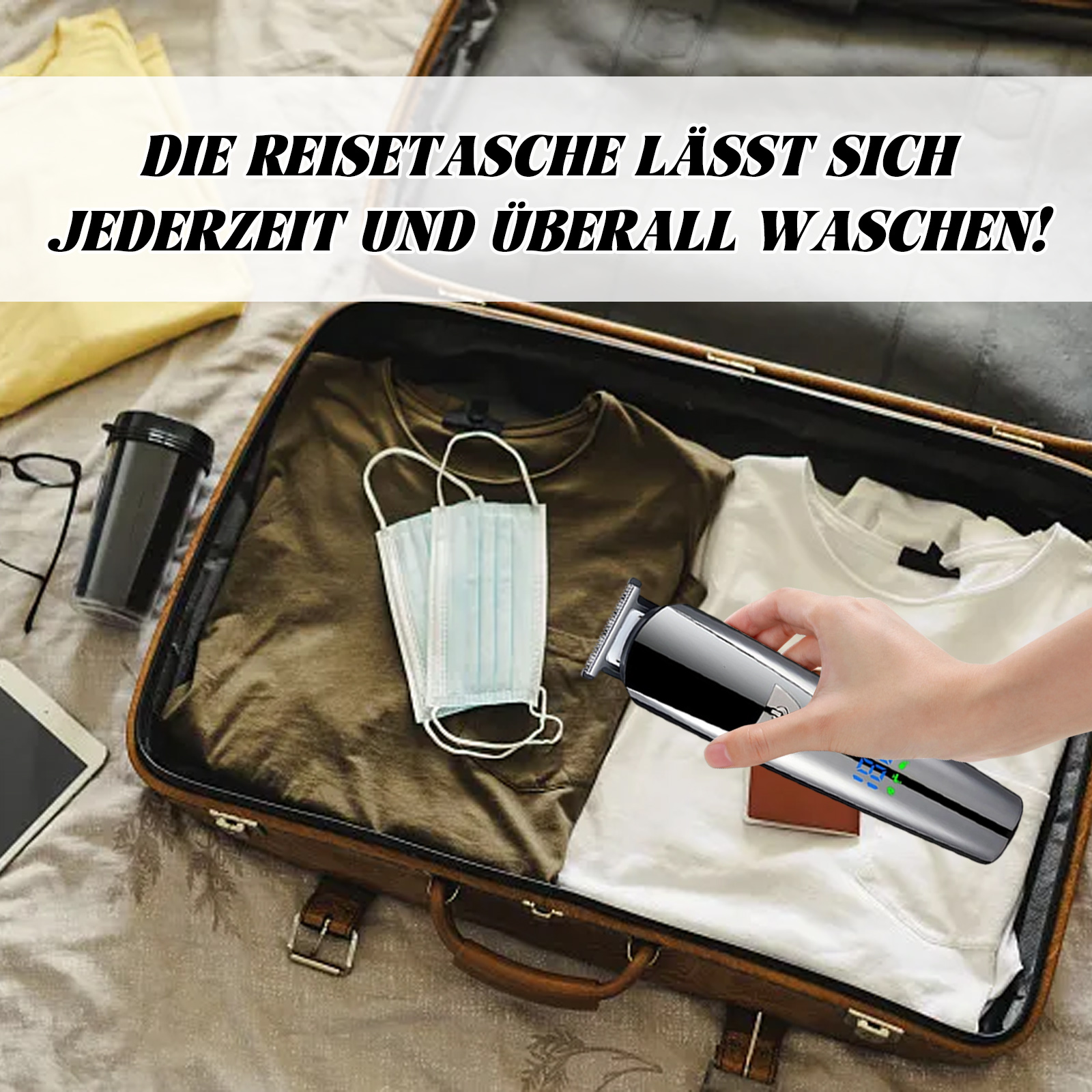 Ein silberner Trimmer in einem offenen Koffer mit Kleidung und Zubehör. Der Trimmer ist im Fokus.