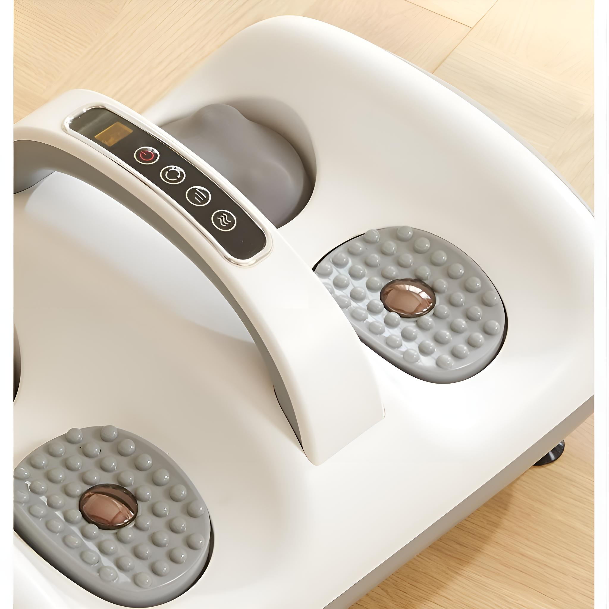 Nahaufnahme Fußmassagegerät, weiß und grau, mit Massagepads und Griff.