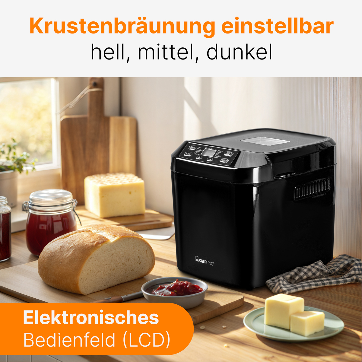 Czarna maszyna do chleba na drewnianym stole, z chlebem, składnikami i tekstem na dole.