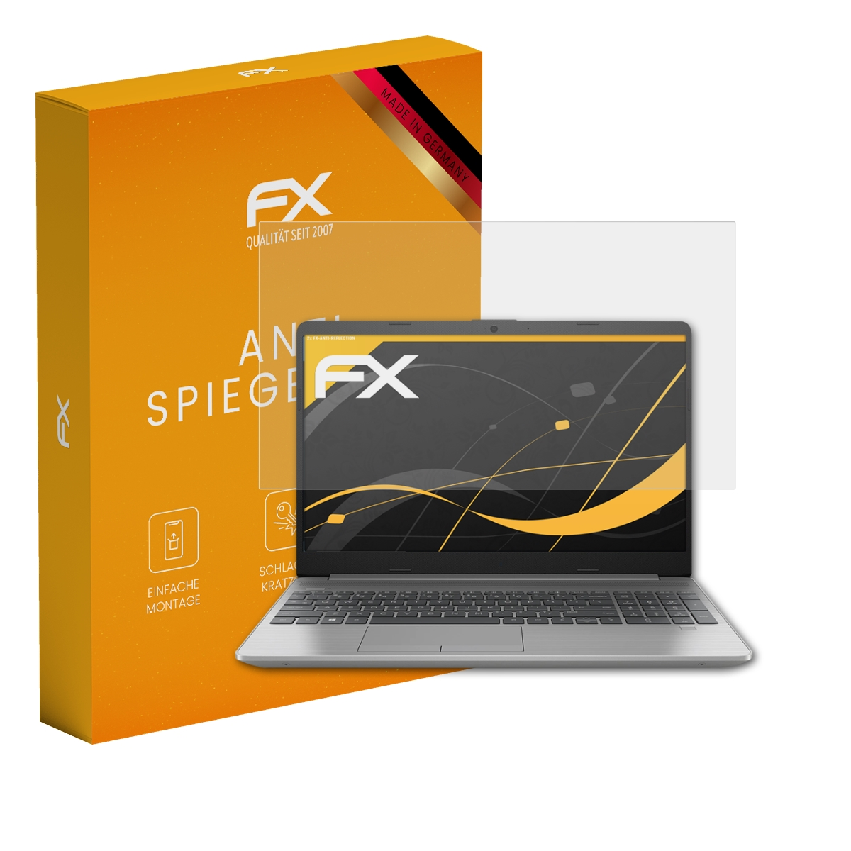 Ein Laptop mit Displayschutz und eine Schachtel mit der Aufschrift 'FX Anti Spiegelu'.