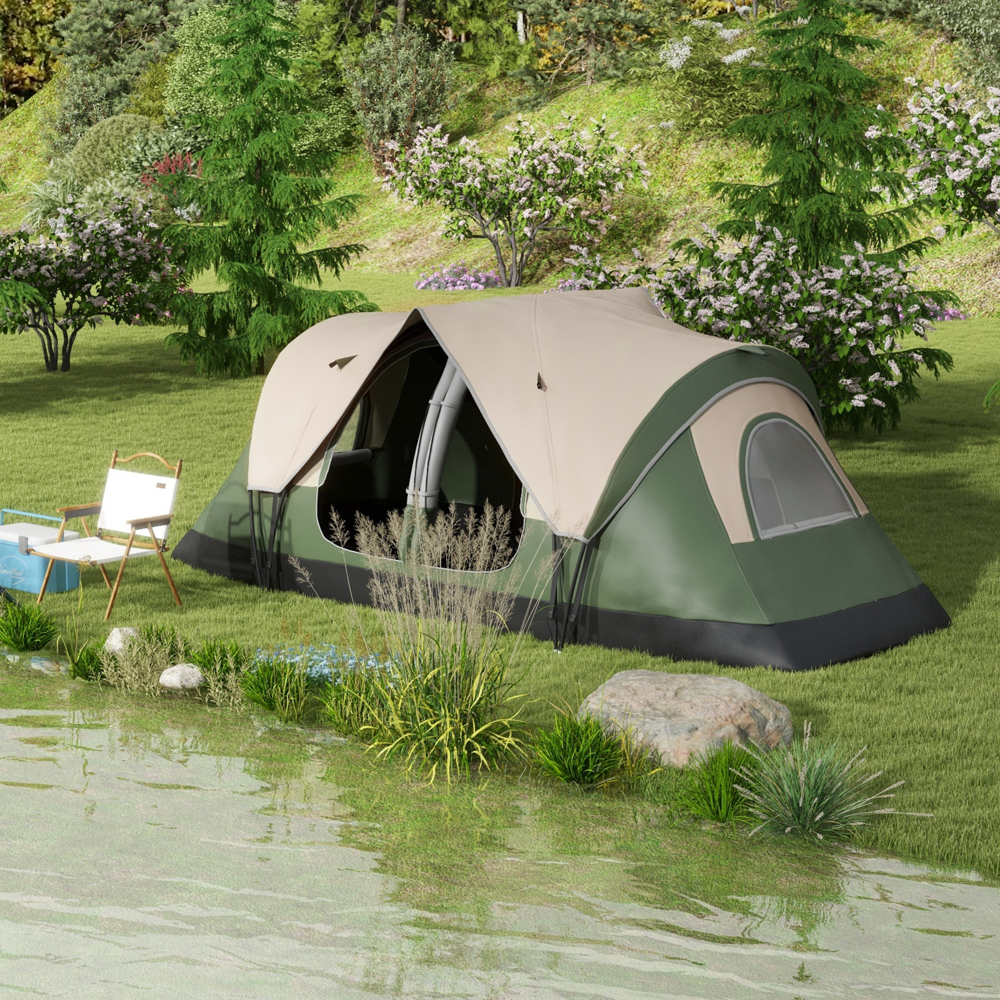 Una tienda de campaña verde y beige está instalada en un área cubierta de hierba junto a un lago.