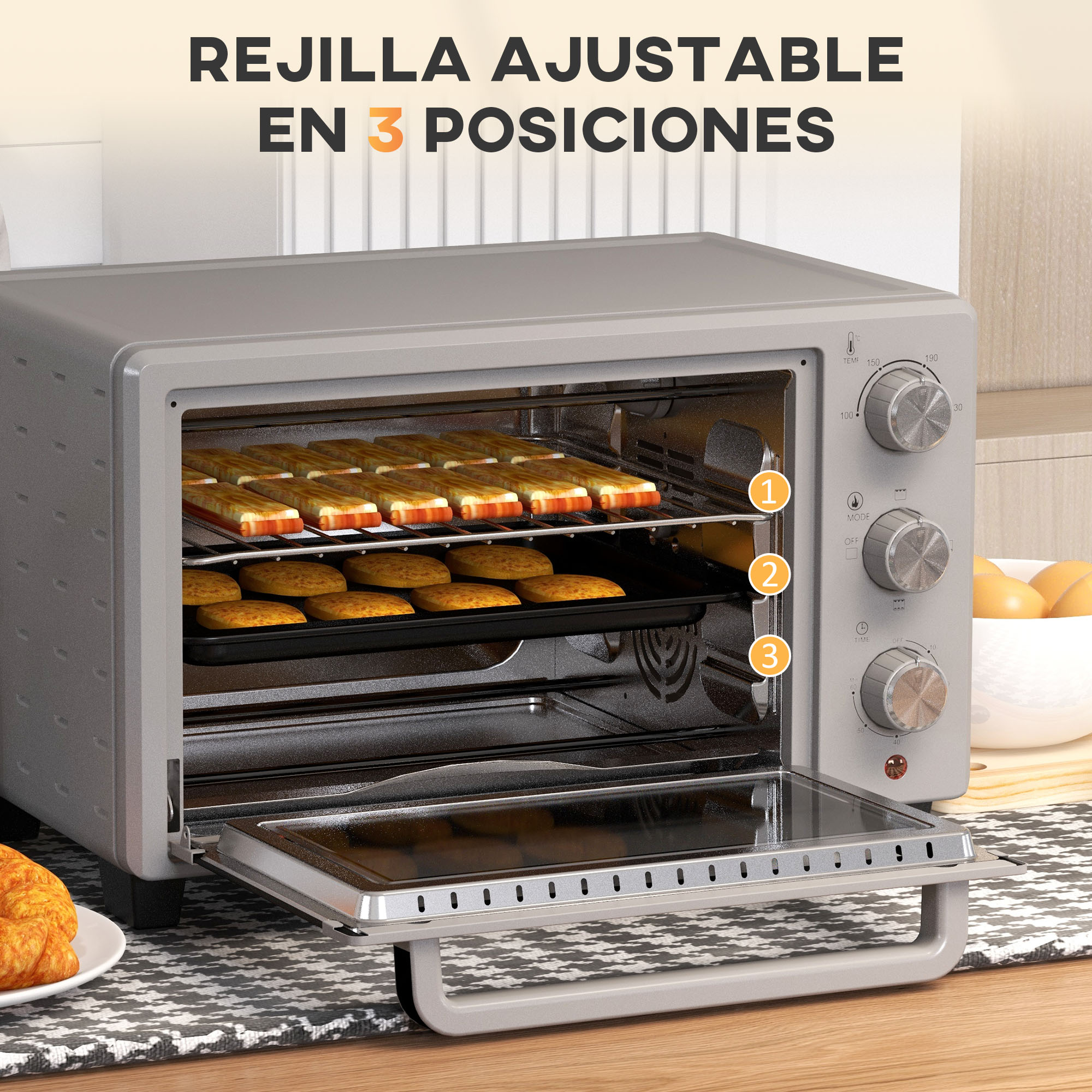 Un horno gris con galletas dentro. El horno tiene tres posiciones ajustables para la rejilla.