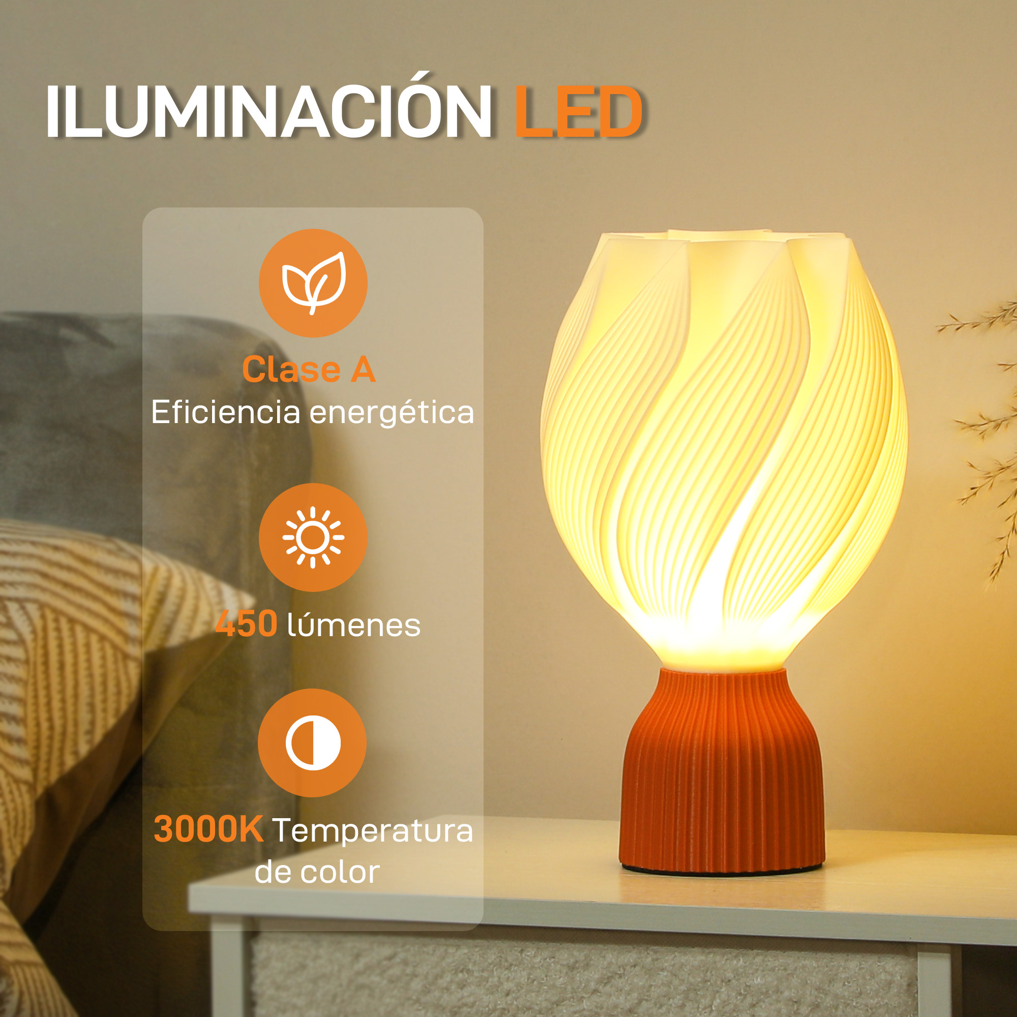 Una base naranja soporta una lámpara blanca con diseño floral sobre una mesa blanca.