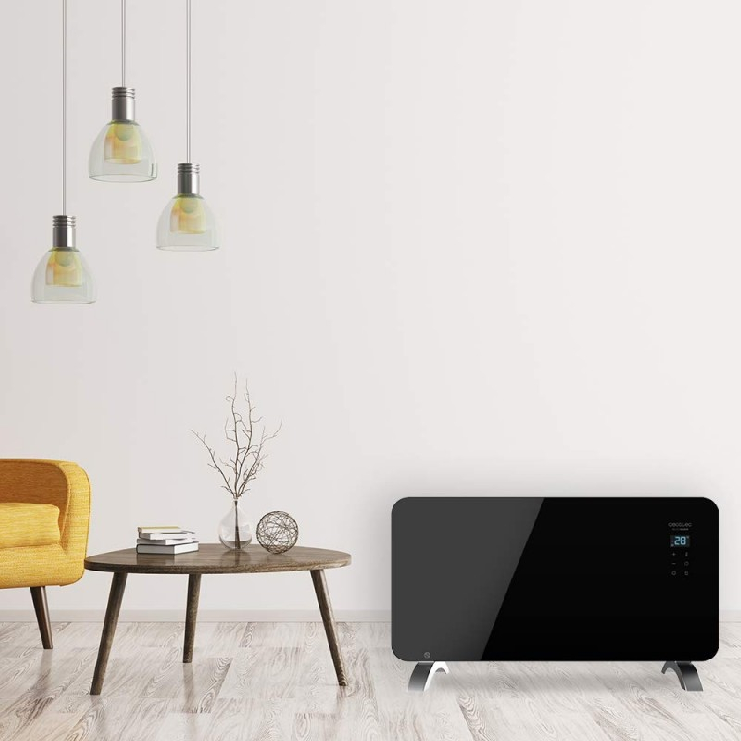 Pokój z grzejnikiem, stołem, żółtym krzesłem i lampami wiszącymi. Ściana jest biała.