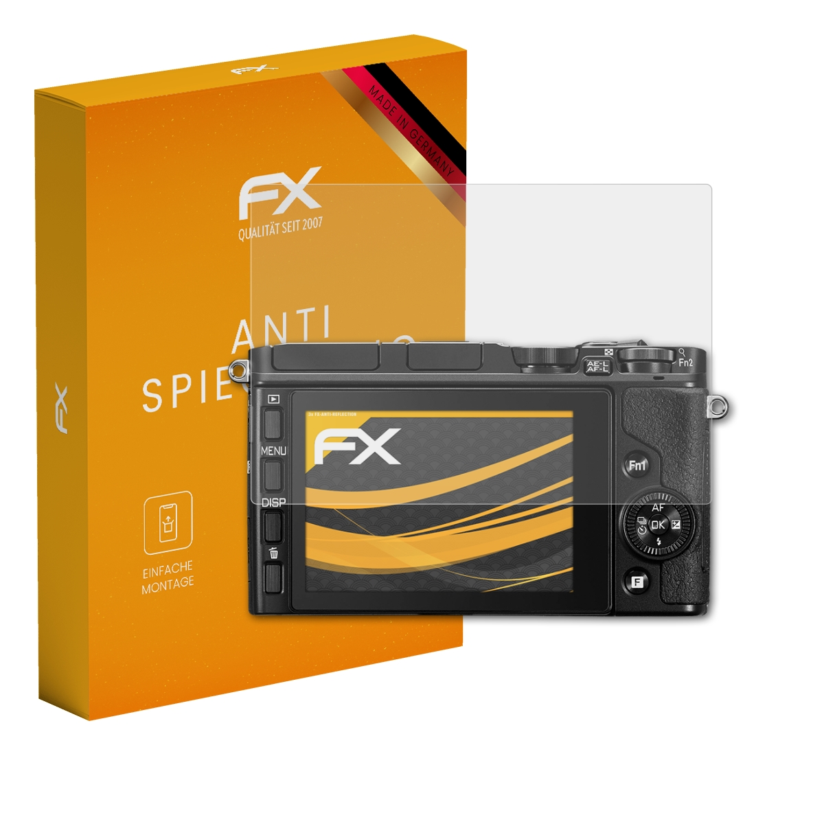 Kamera mit Displayschutz und Box. Die Box ist orange und hat ein FX-Logo.
