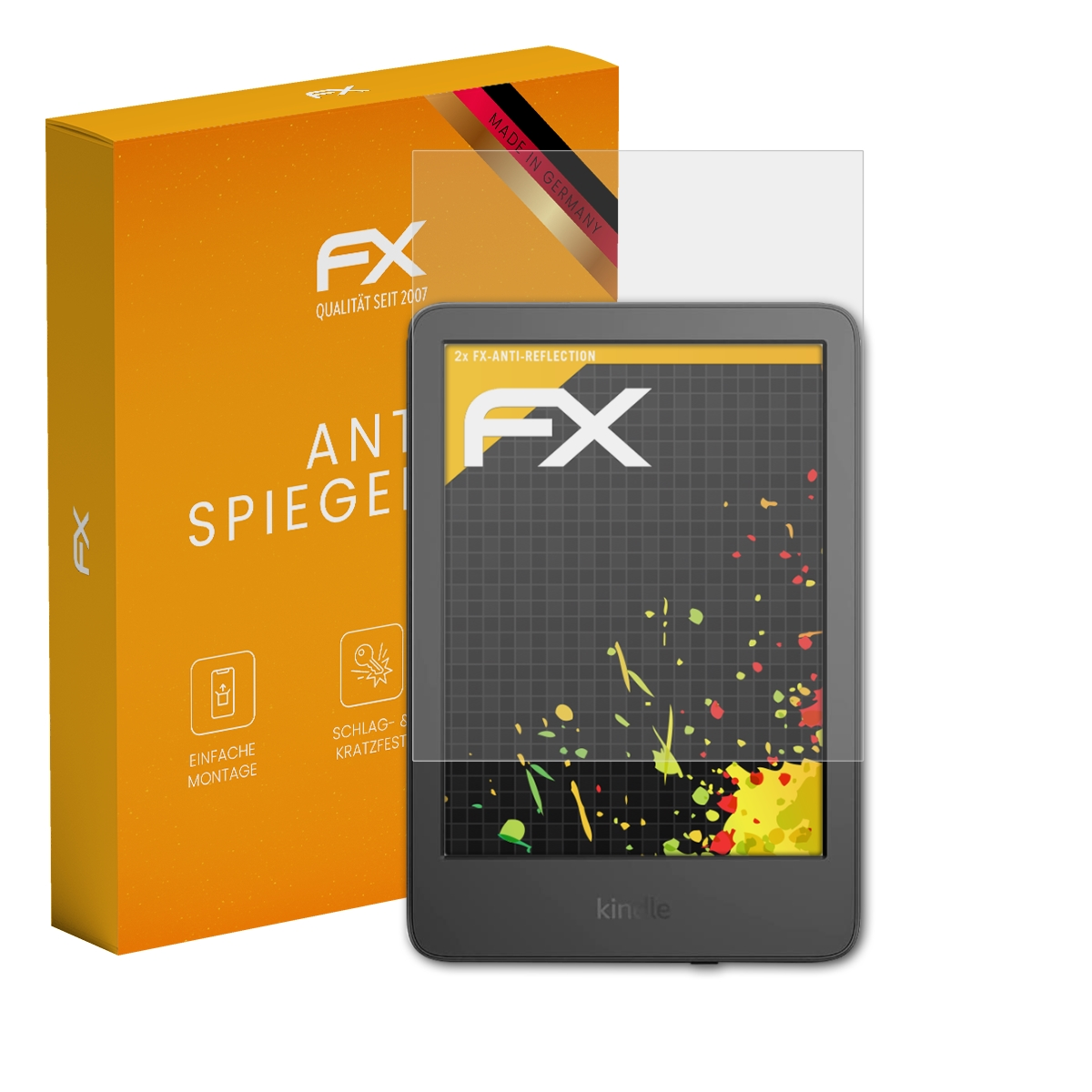 Ein Kindle, Displayschutzfolie und Schachtel. Kindle hat einen Farbspritzer auf dem Bildschirm. Schachtel ist orange.