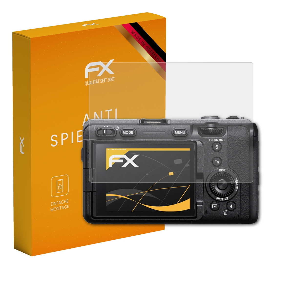 Kamera mit Displayschutz, Box mit Logo. Orange Box mit 'Anti Spieglu'. Kamera ist schwarz.