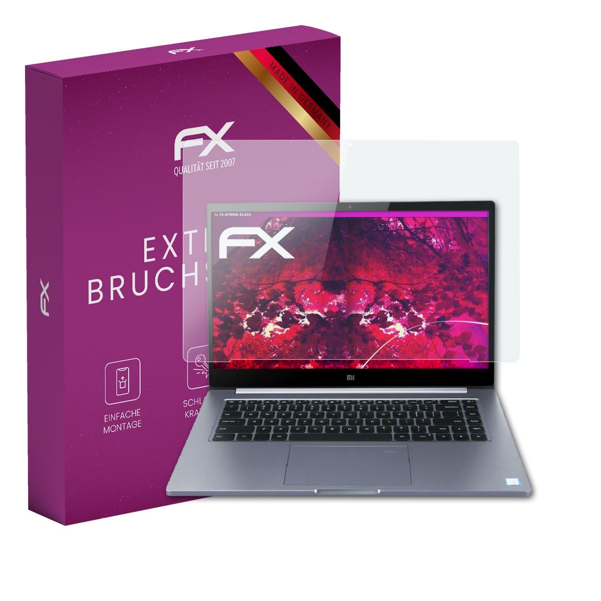 Laptop mit Displayschutz und Verpackung. Auf der Box steht 'Extrem Bruchsicher'.