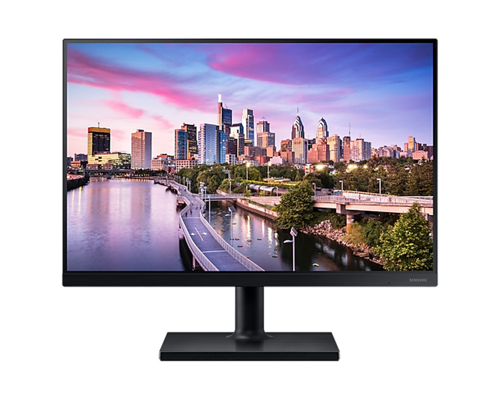 Monitor per computer nero che mostra una scena cittadina con un fiume e un ponte. Il cielo è colorato.