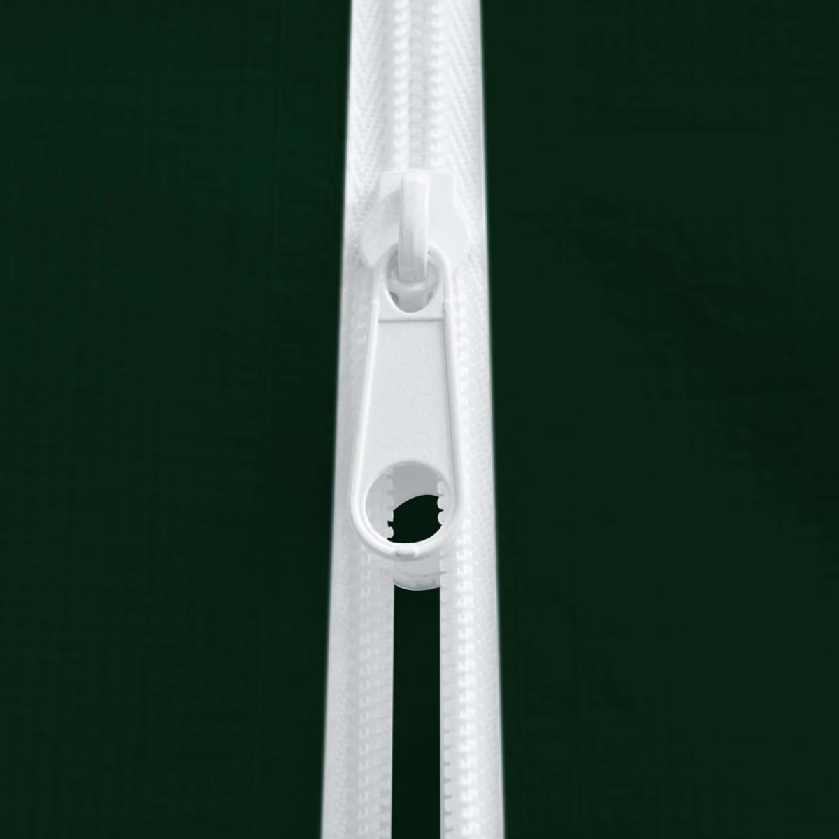 Tirazip bianco su sfondo verde scuro.