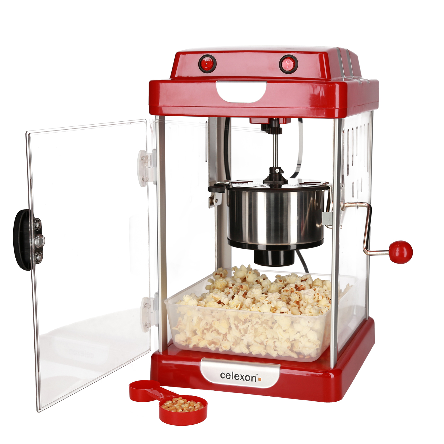 Roter Popcornmaker mit offener Tür und Popcorn. Rote Schaufel im Vordergrund.