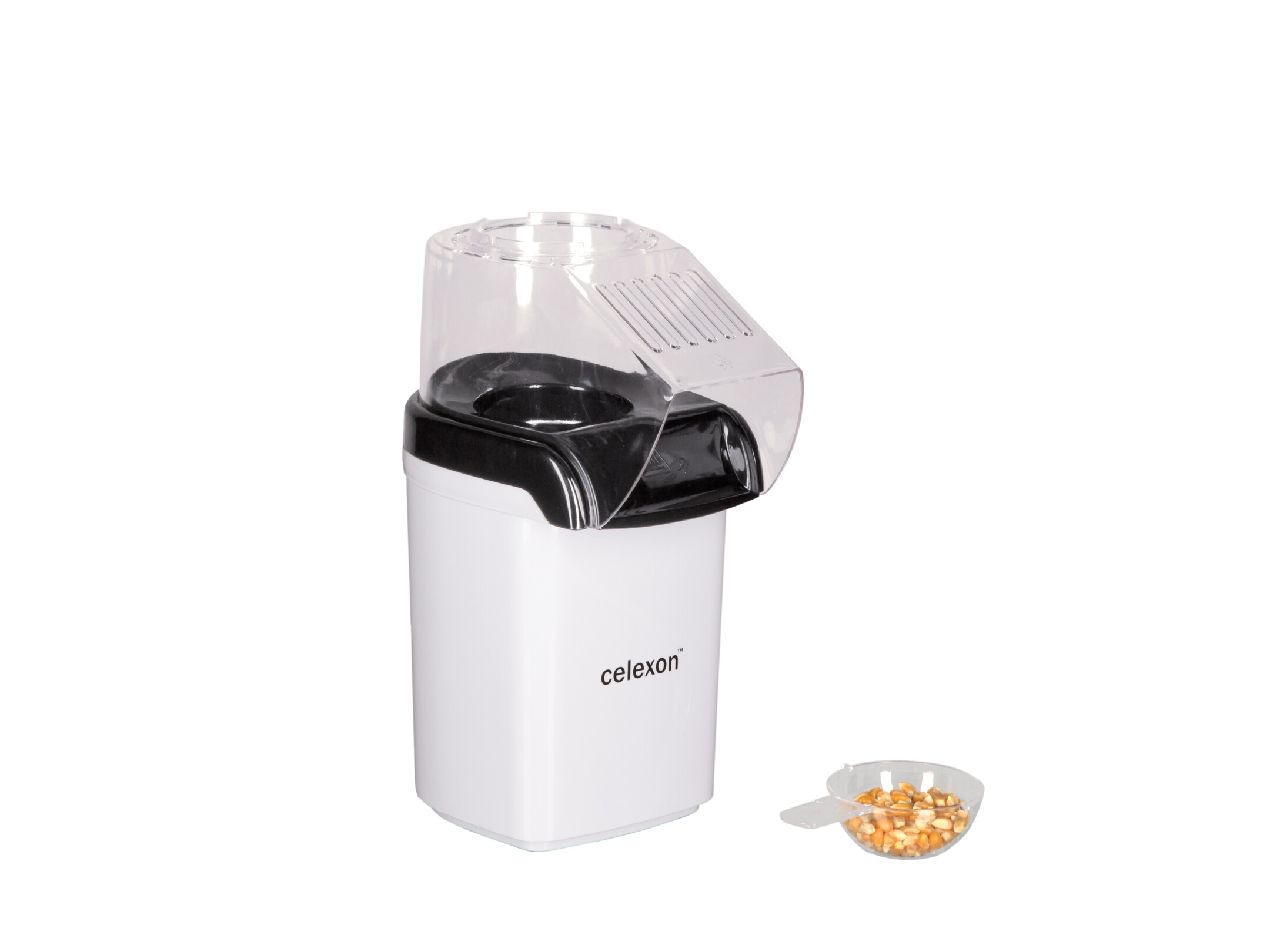 Ein weißer Popcorn-Maker mit schwarzen Akzenten wird neben einem transparenten Messbecher gezeigt, der mit Maiskörnern gefüllt ist.