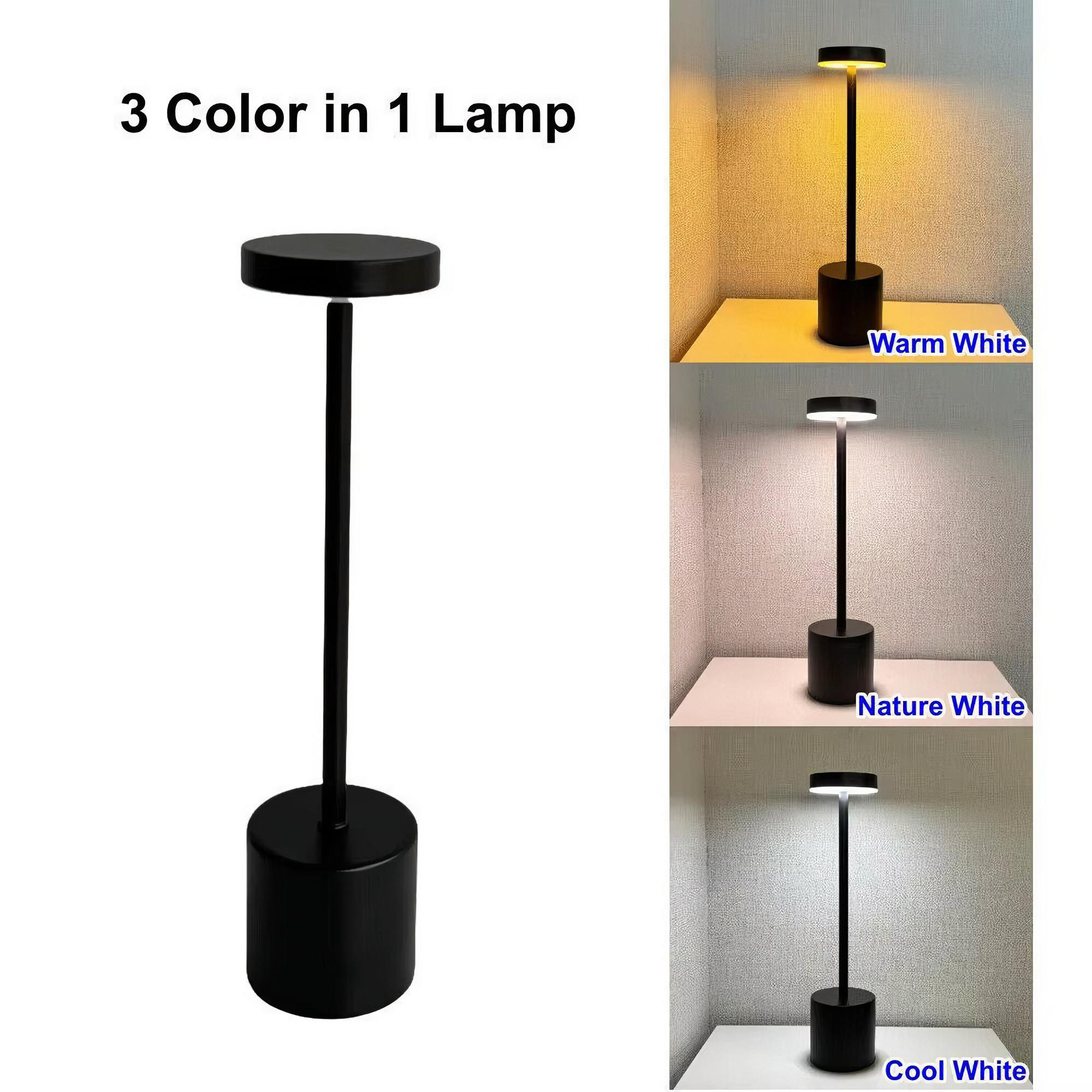 Eine schwarze Lampe mit drei Farboptionen: warmweiß, naturweiß und kaltweiß. Die Lampe steht auf einem Tisch.