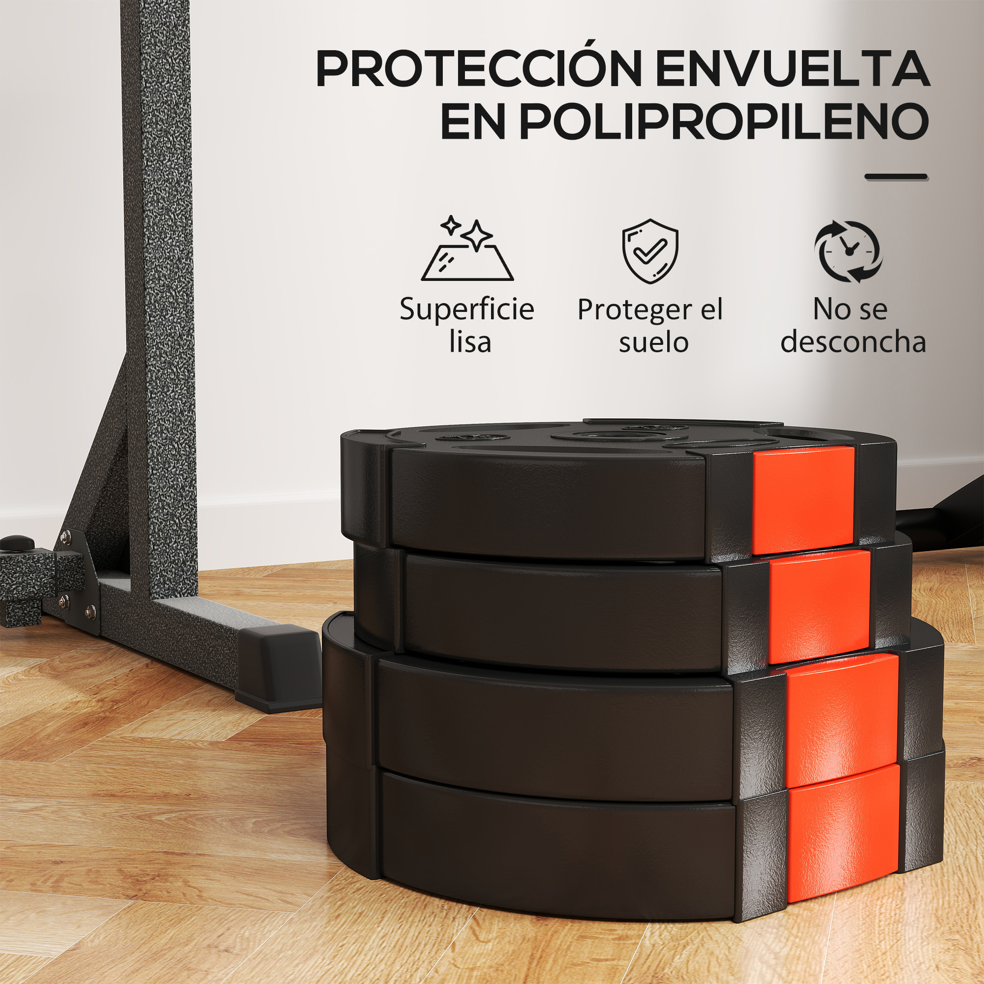 Platos de pesas negros y naranjas apilados. Equipamiento de gimnasio junto a una estructura de soporte metálica.