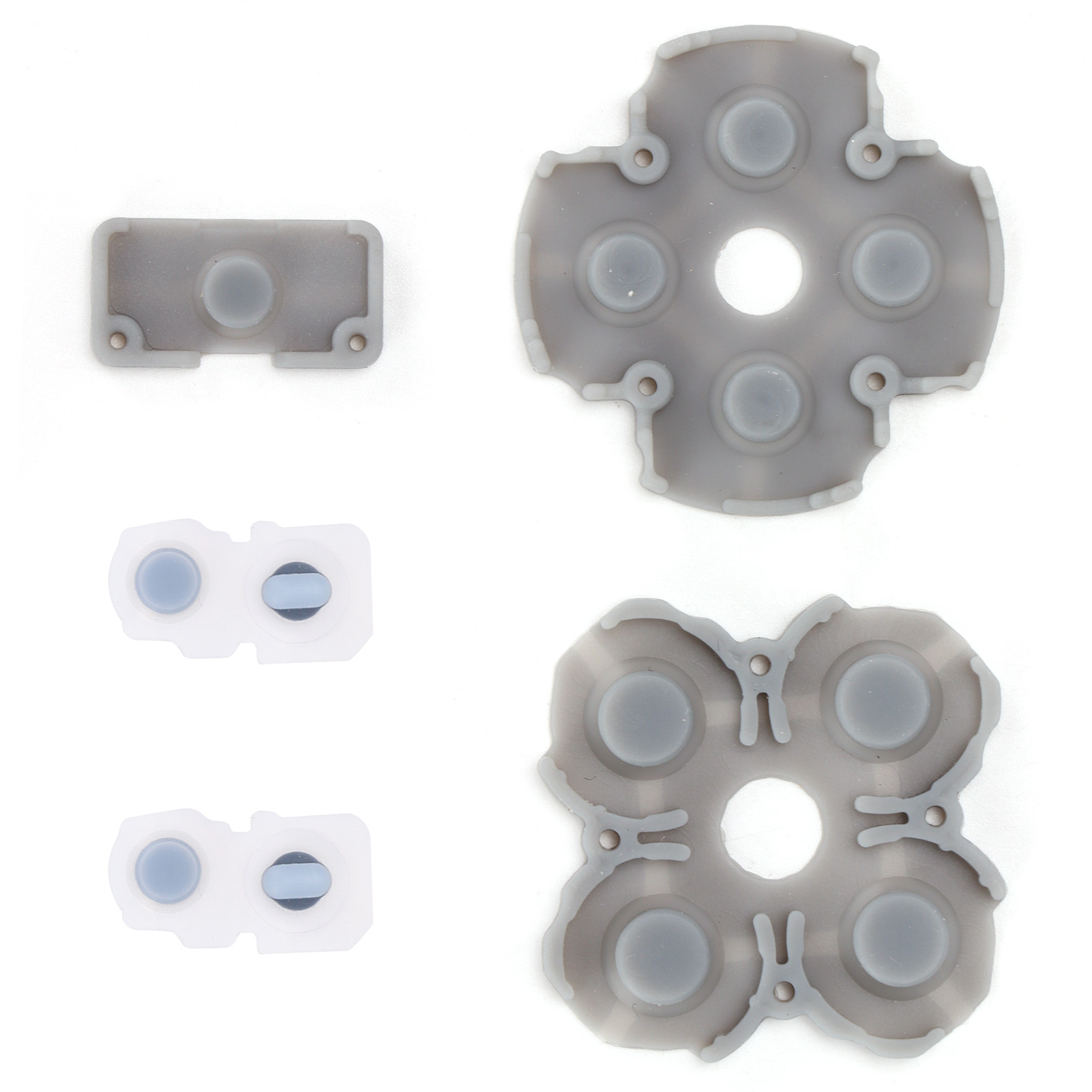 Graue Silikon-Knopf-Pads für einen Controller auf weißem Hintergrund.