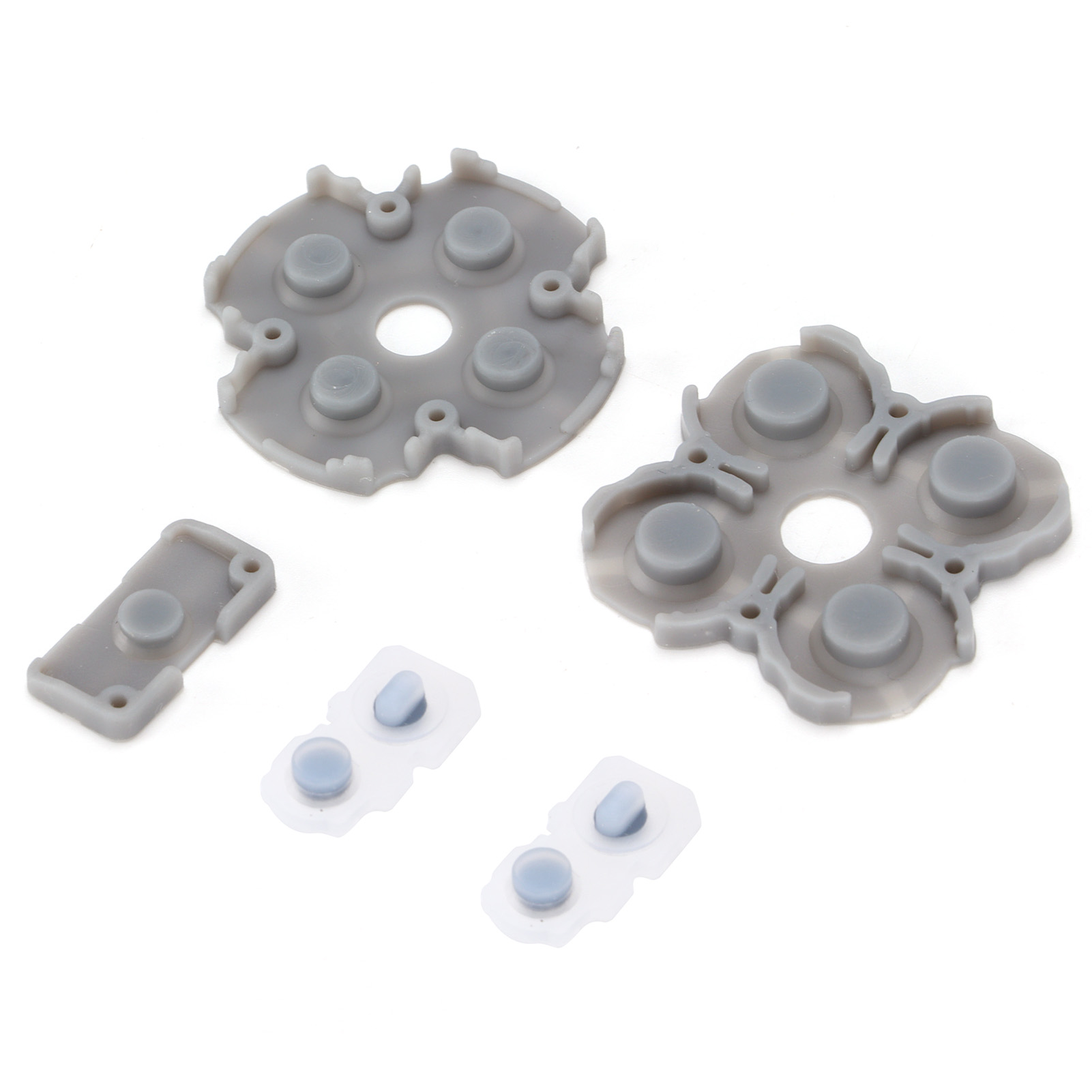 Graue Silikon-Knopf-Pads für einen Controller auf weißem Hintergrund.