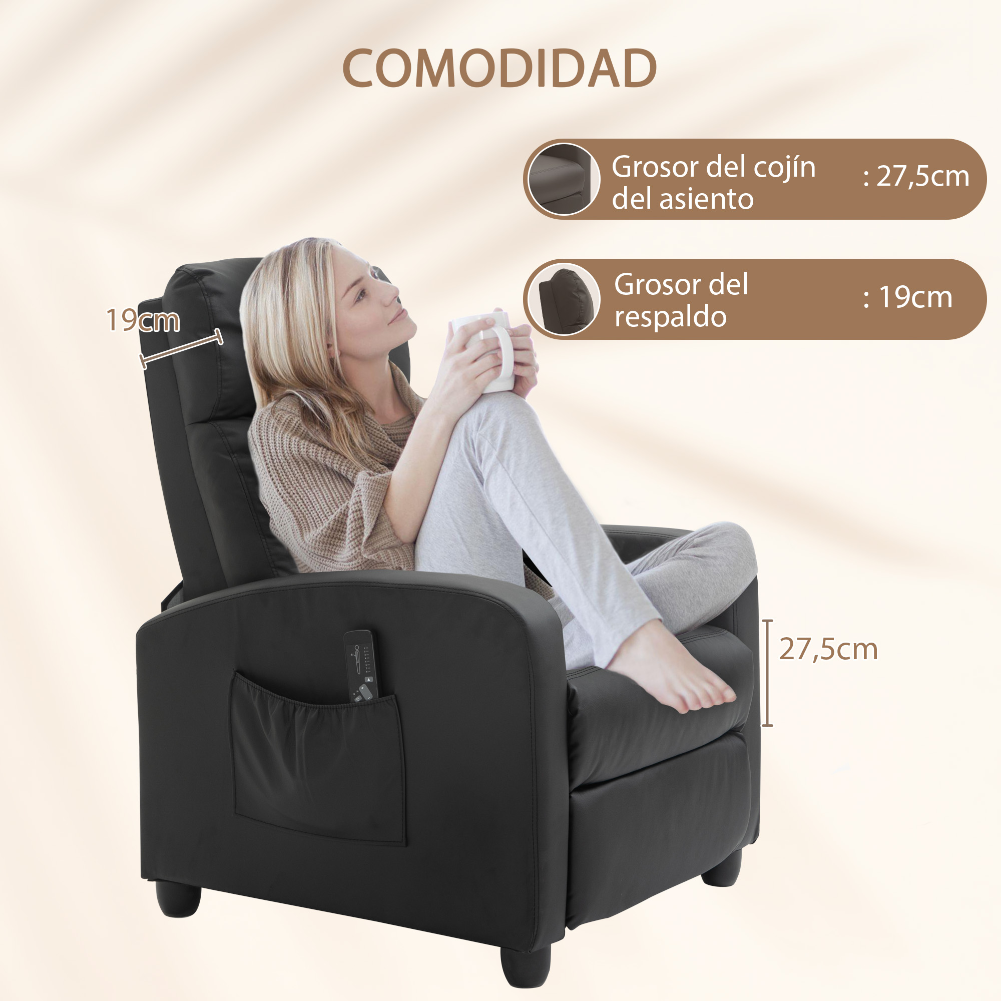 Mujer sentada en un sillón negro, sosteniendo una taza.