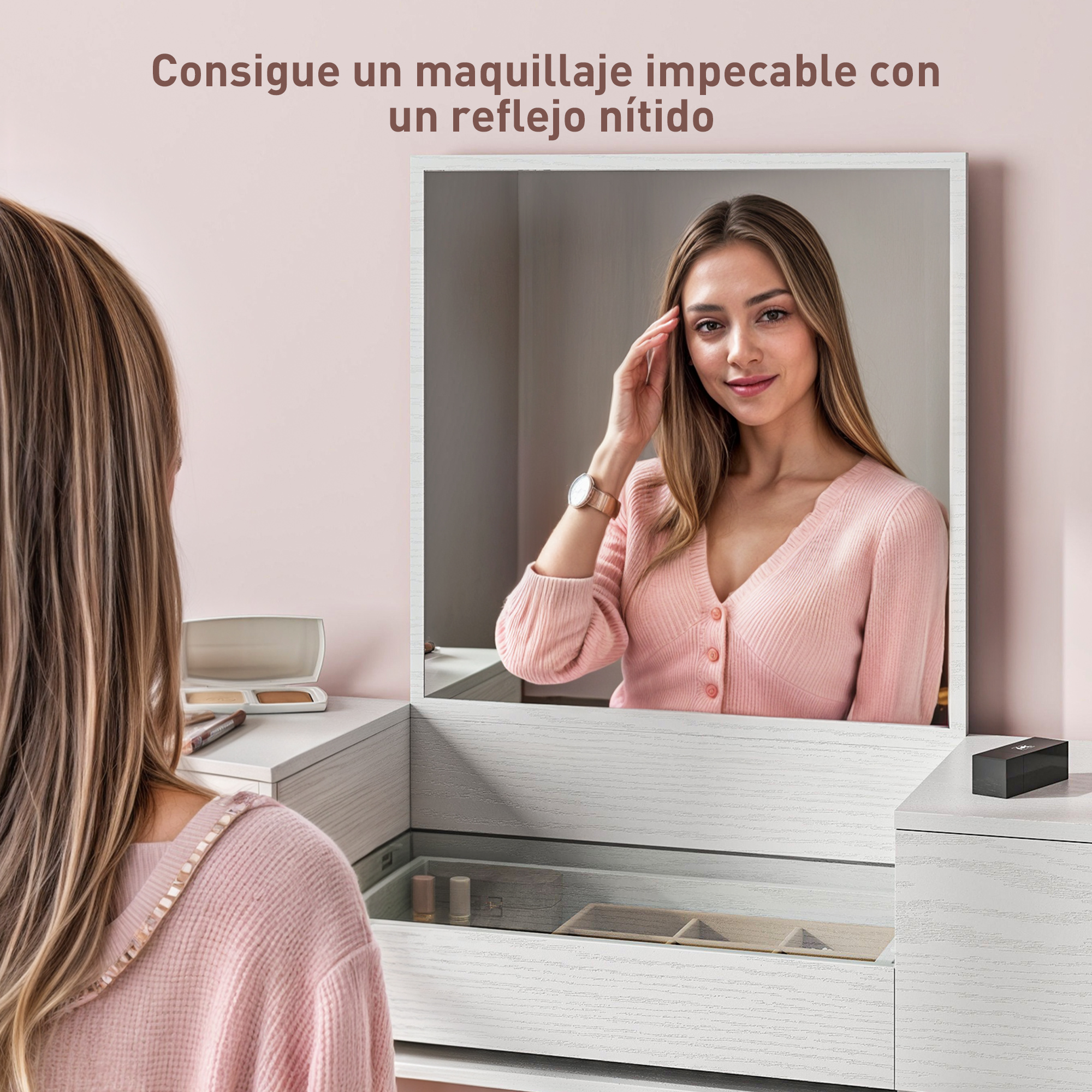 Una mujer con una chaqueta de punto rosa se mira en el espejo de un tocador.