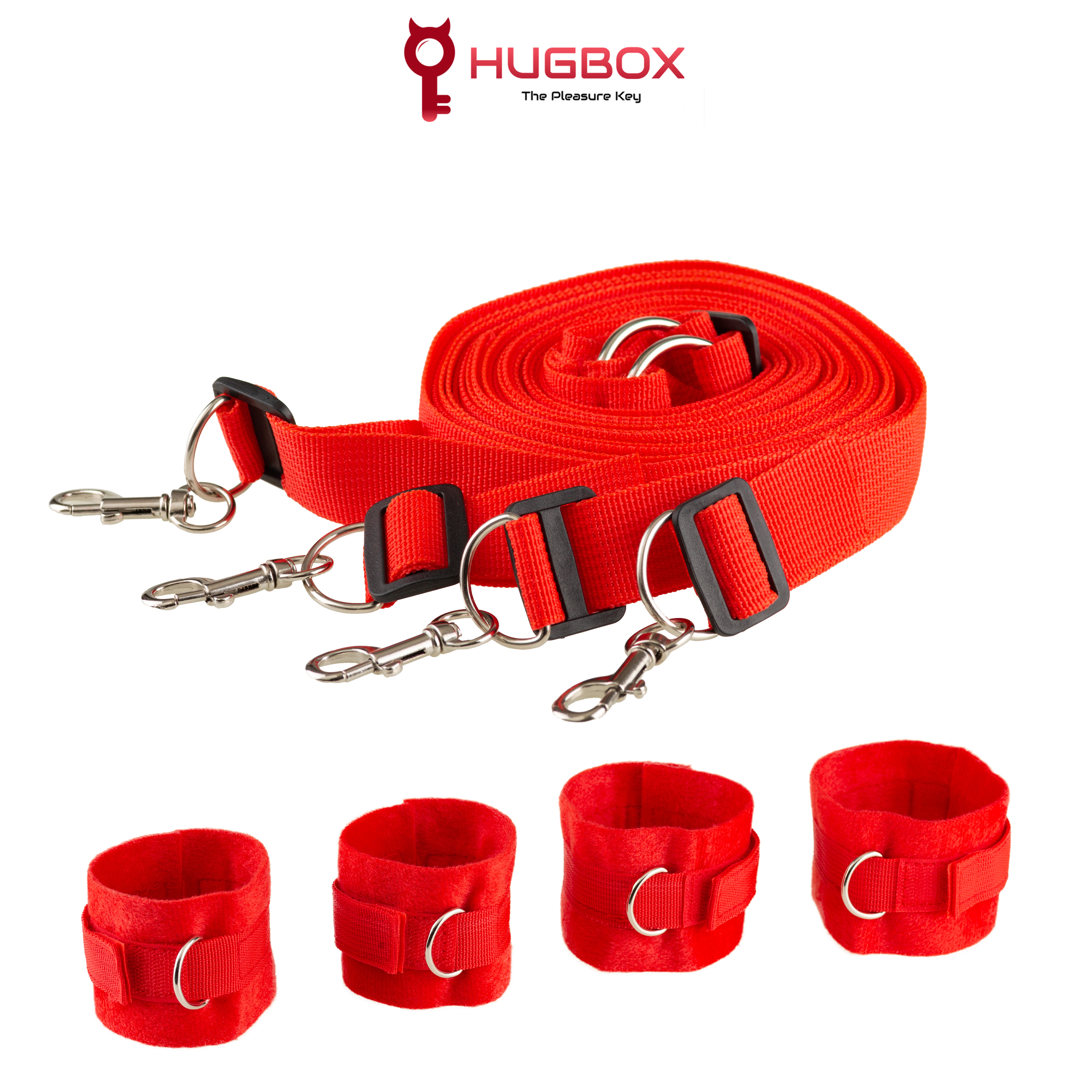 Juego de juguetes sexuales de correas y esposas rojas. Cierres y hebillas plateadas. Logotipo de Hugbox arriba.