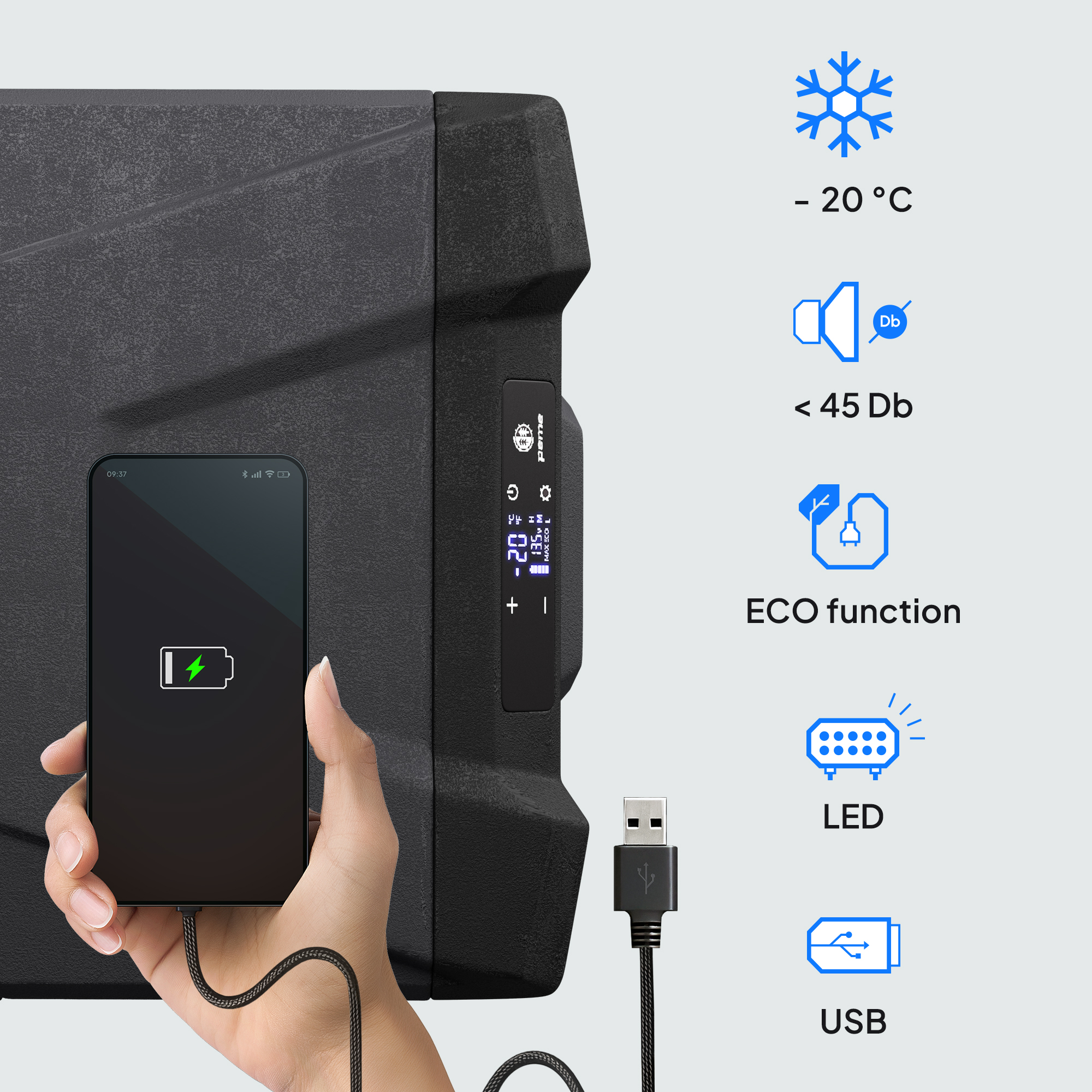 Teléfono cargándose con cable USB conectado a una nevera negra, y se muestran iconos.