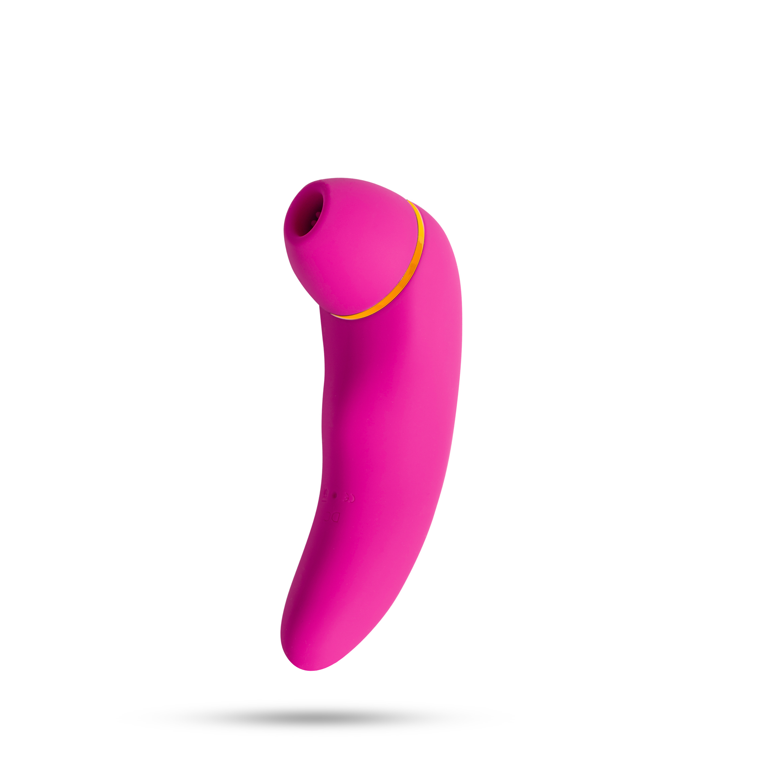 Un vibrador rosa, con anillo amarillo, sobre fondo blanco.
