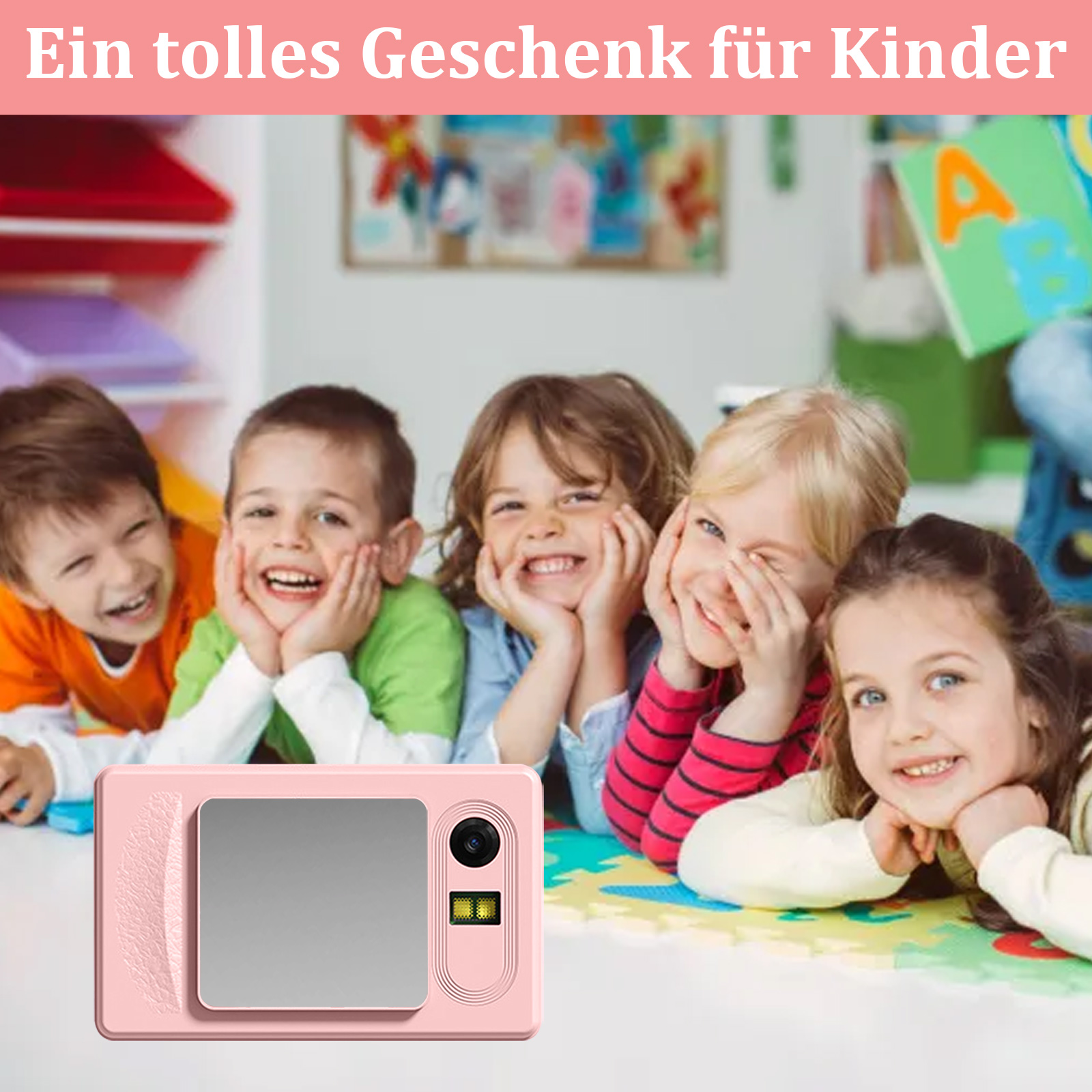 Fünf lächelnde Kinder in einem Klassenzimmer. Ein rosafarbenes Spielzeug liegt davor. Text oben: 'Ein tolles Geschenk'.