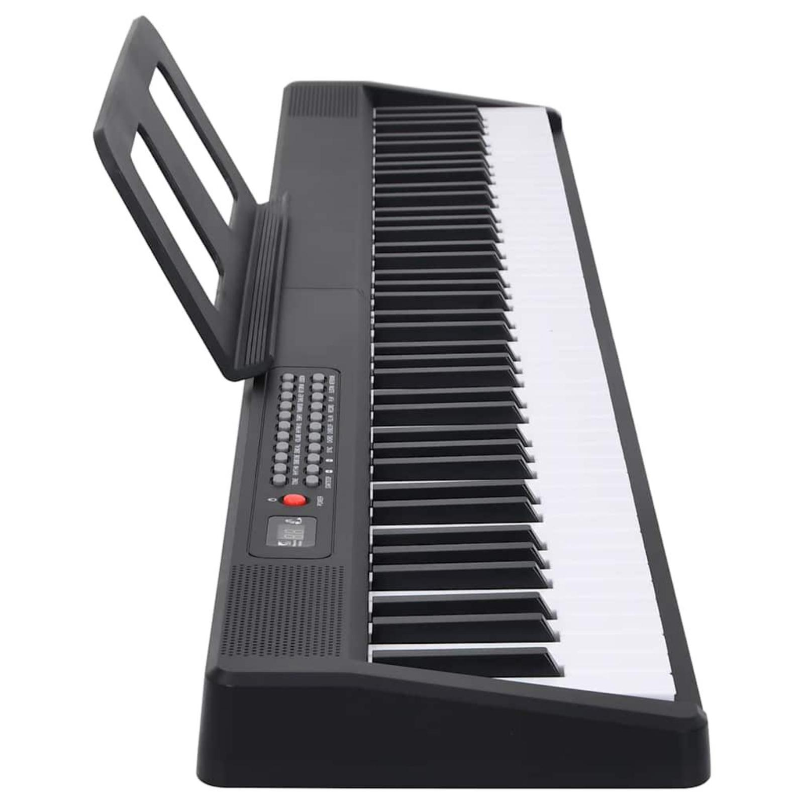 Schwarzes elektronisches Keyboard mit weißen Tasten, Notenständer und Bedientasten.
