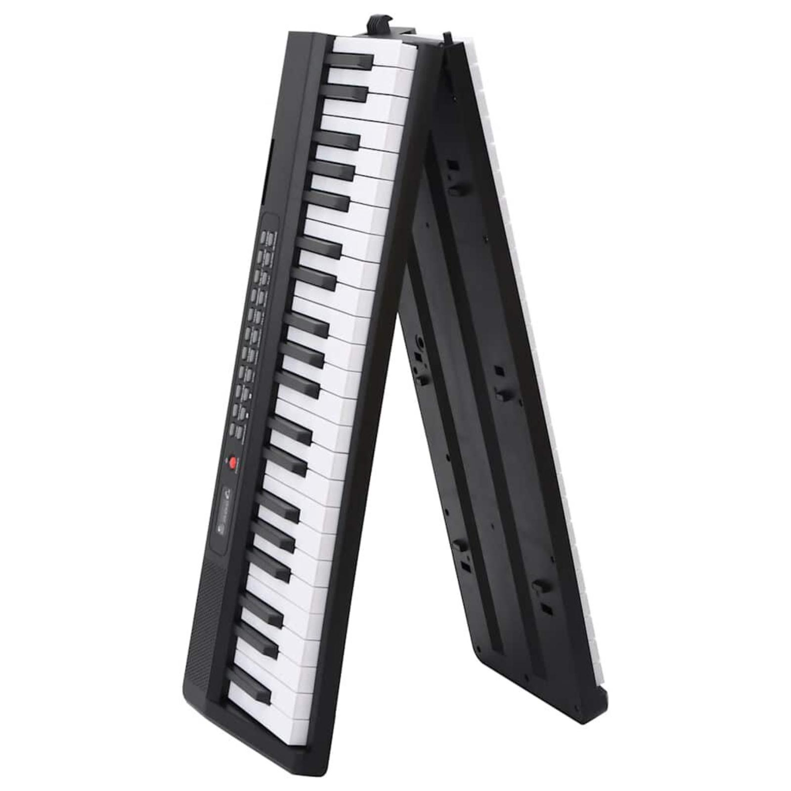 Ein schwarz-weißes elektronisches Keyboard ist geöffnet. Die Tasten sind sichtbar, und eine Steuerung befindet sich an der Seite.