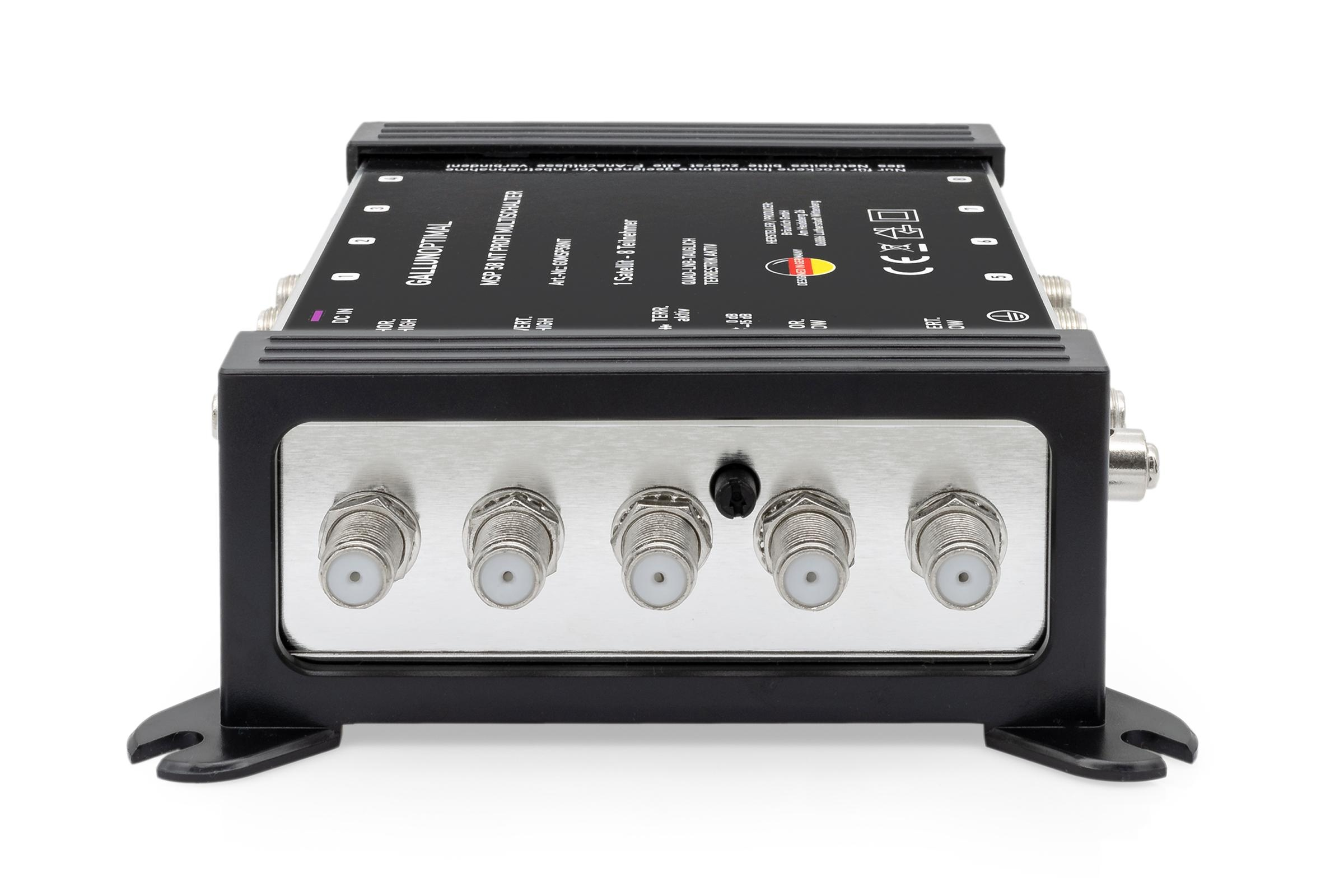 Schwarzes elektronisches Gerät mit silbernen Anschlüssen und Text. Enthält Eingangs-/Ausgangsanschlüsse und Herstellerdetails.