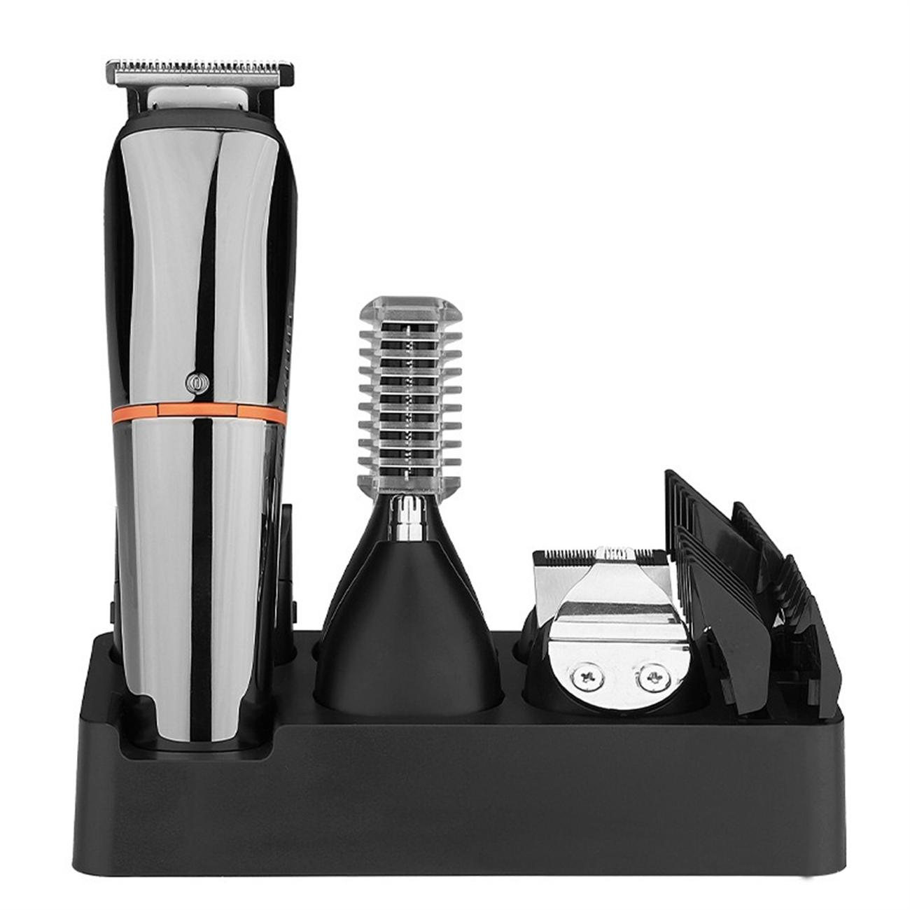Ein Pflege-Set mit Trimmer, Aufsätzen und Nasenhaartrimmer, alles in einem schwarzen Halter. Der Trimmer ist silber und schwarz.