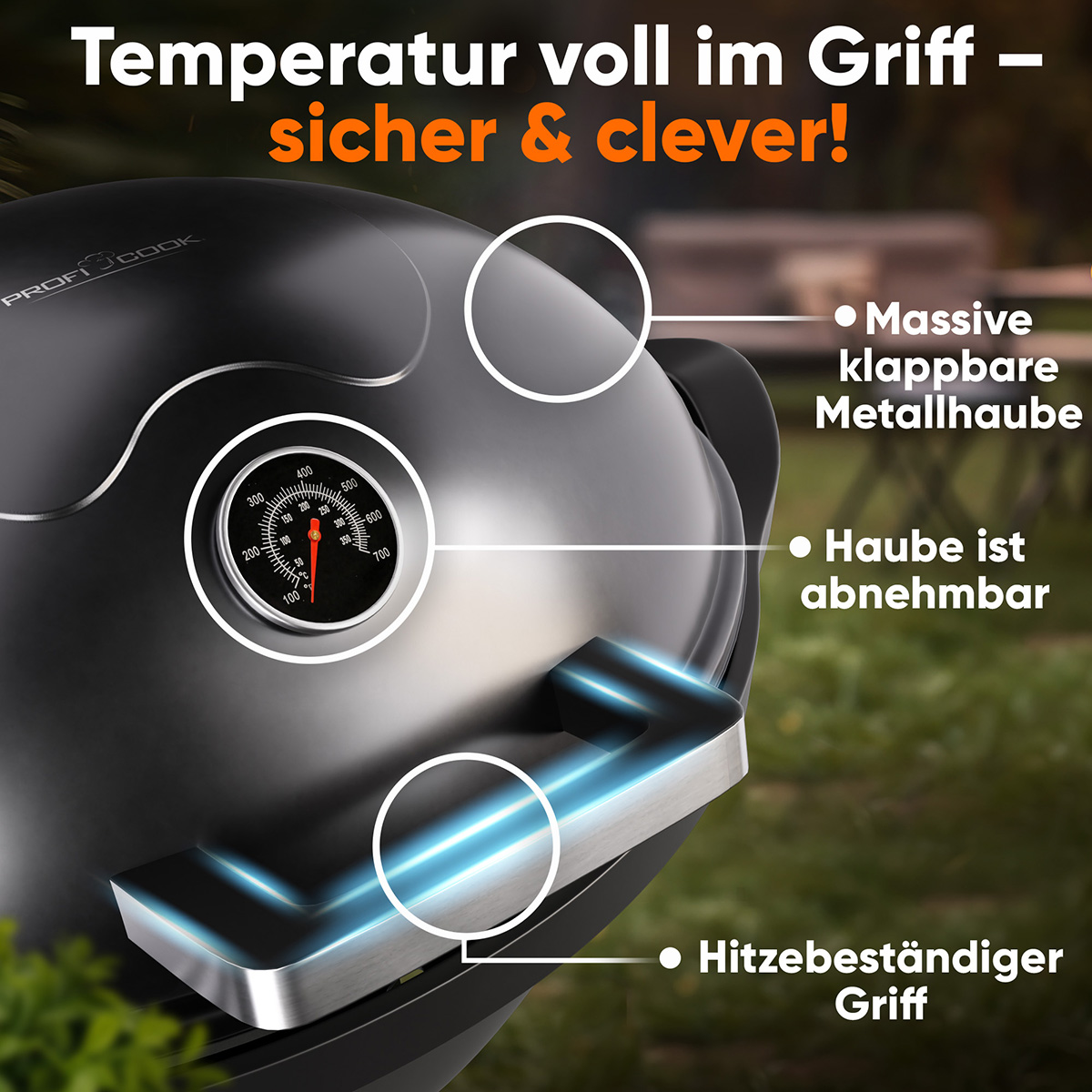 Primo piano di una griglia nera con indicatore di temperatura. Include una maniglia e un grande cofano in metallo pieghevole.