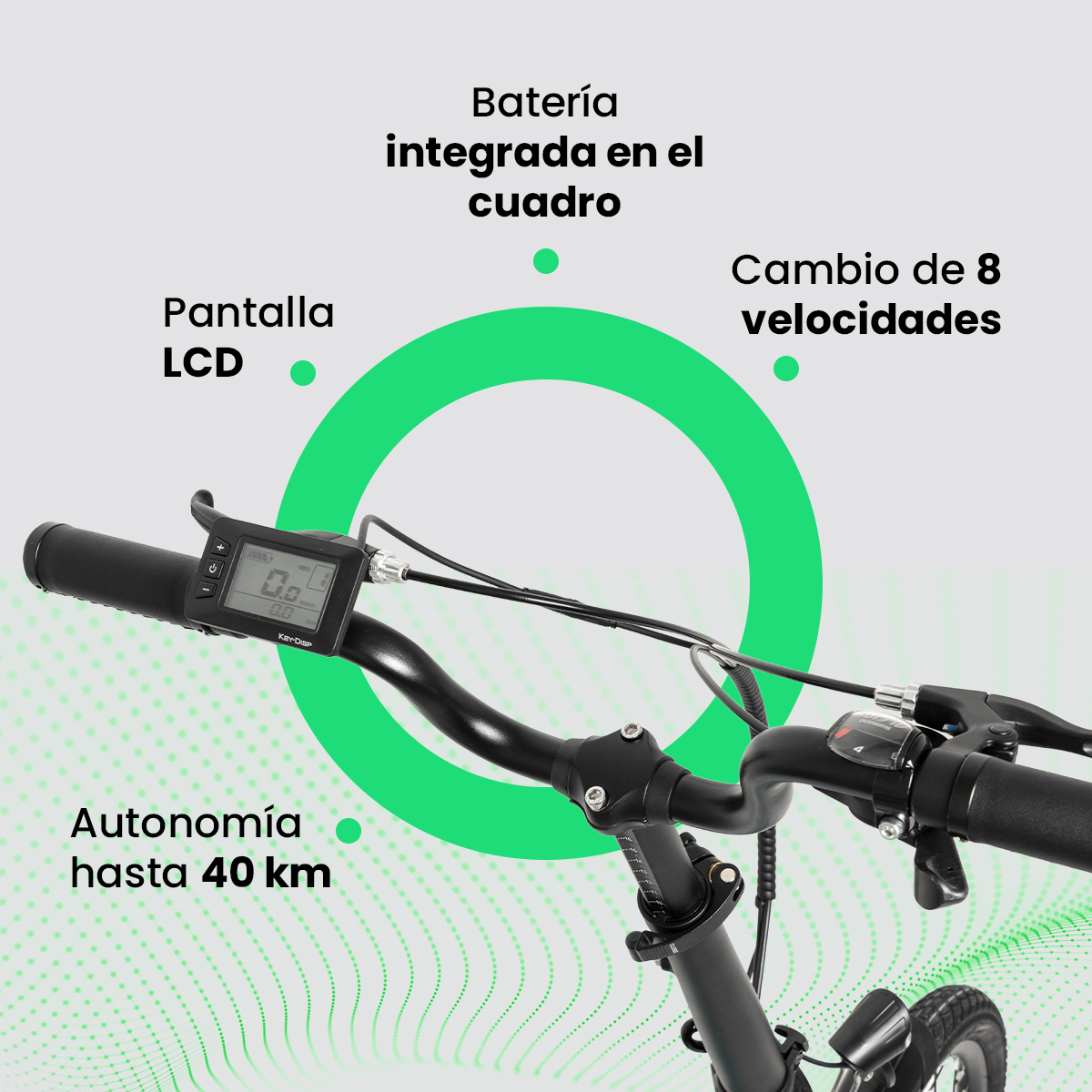 Primer plano del manillar de una bicicleta con pantalla LCD, cambio de 8 velocidades y batería integrada. Autonomía hasta 40 km.
