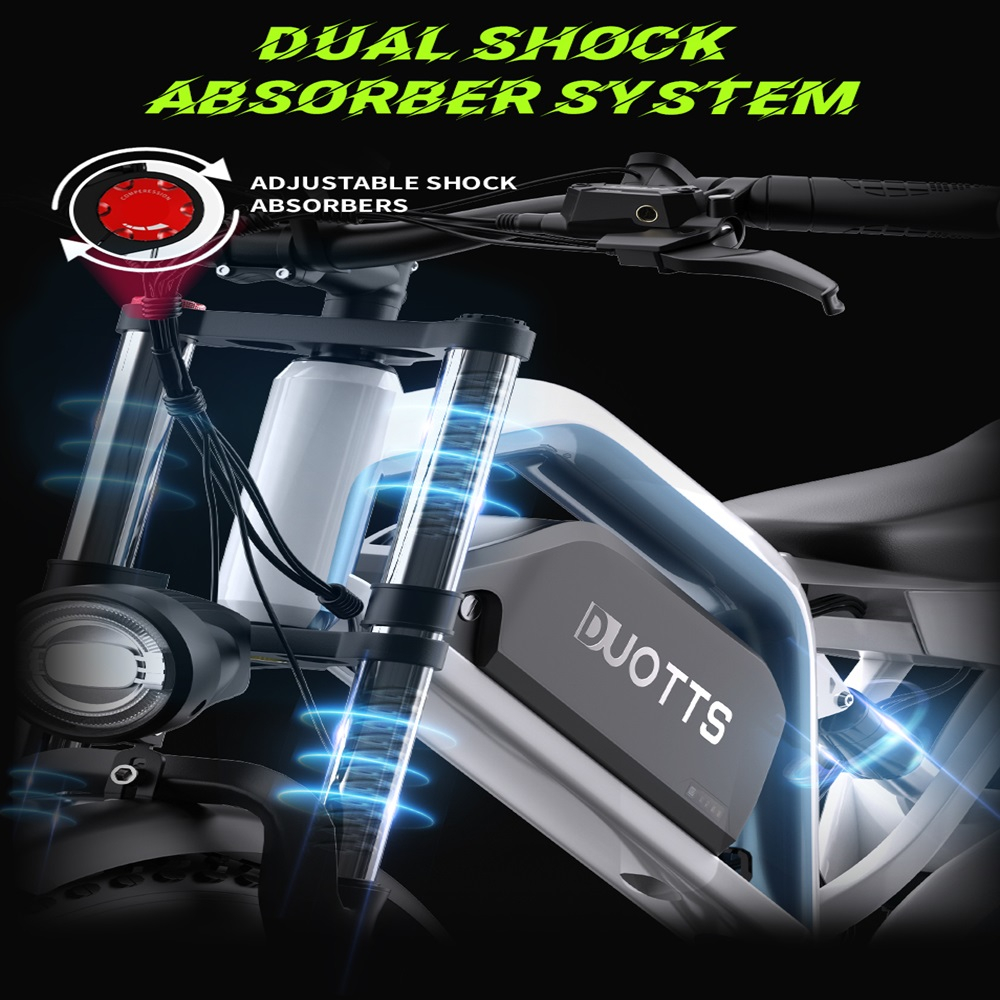 Dettaglio di una e-bike. L'immagine evidenzia il sistema a doppio ammortizzatore, con focus sulla sospensione anteriore e il logo DUOTTS.