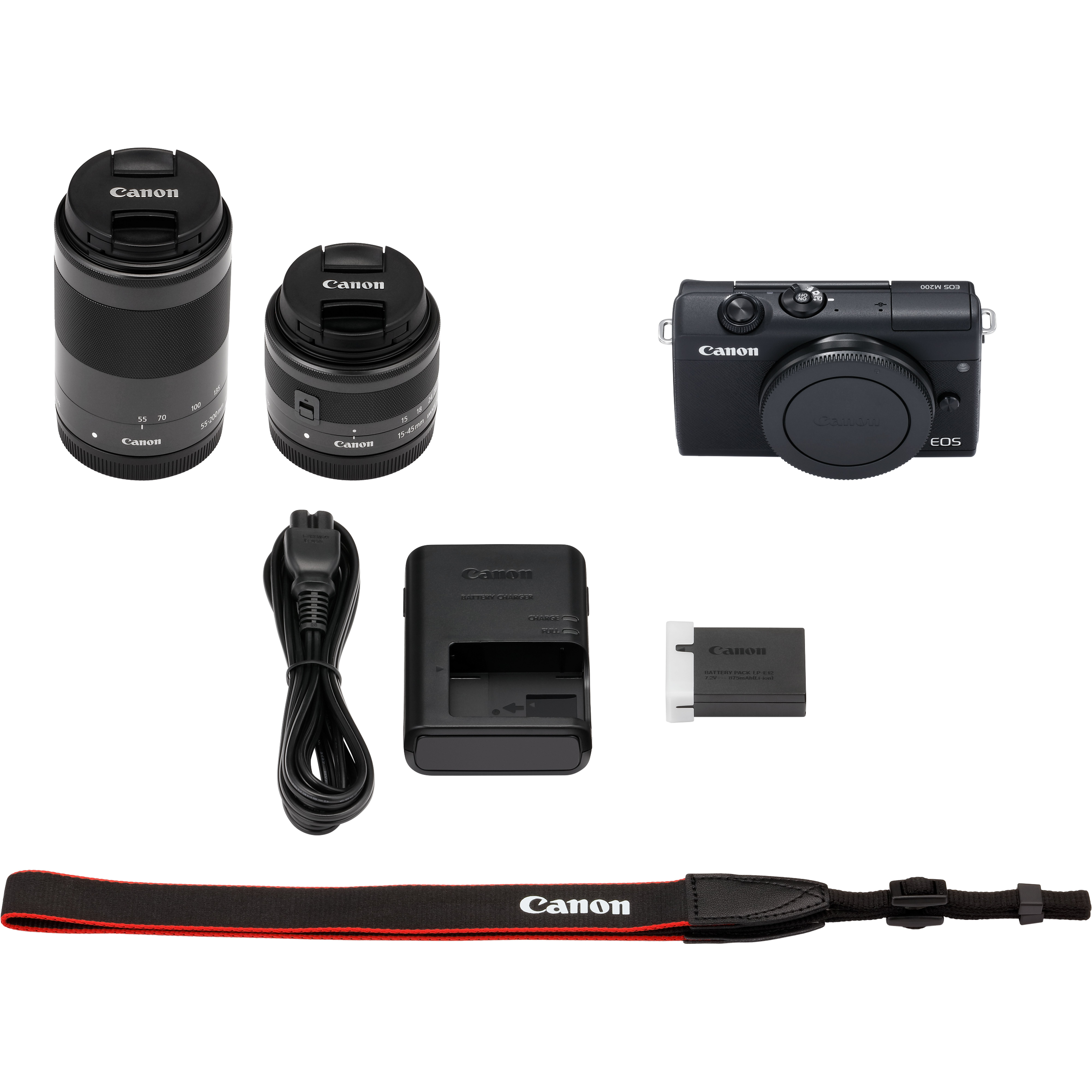 Ein Canon-Kamera-Kit, einschließlich Kamera, Objektive, Ladegerät, Akku und Gurt, alles vor weißem Hintergrund.