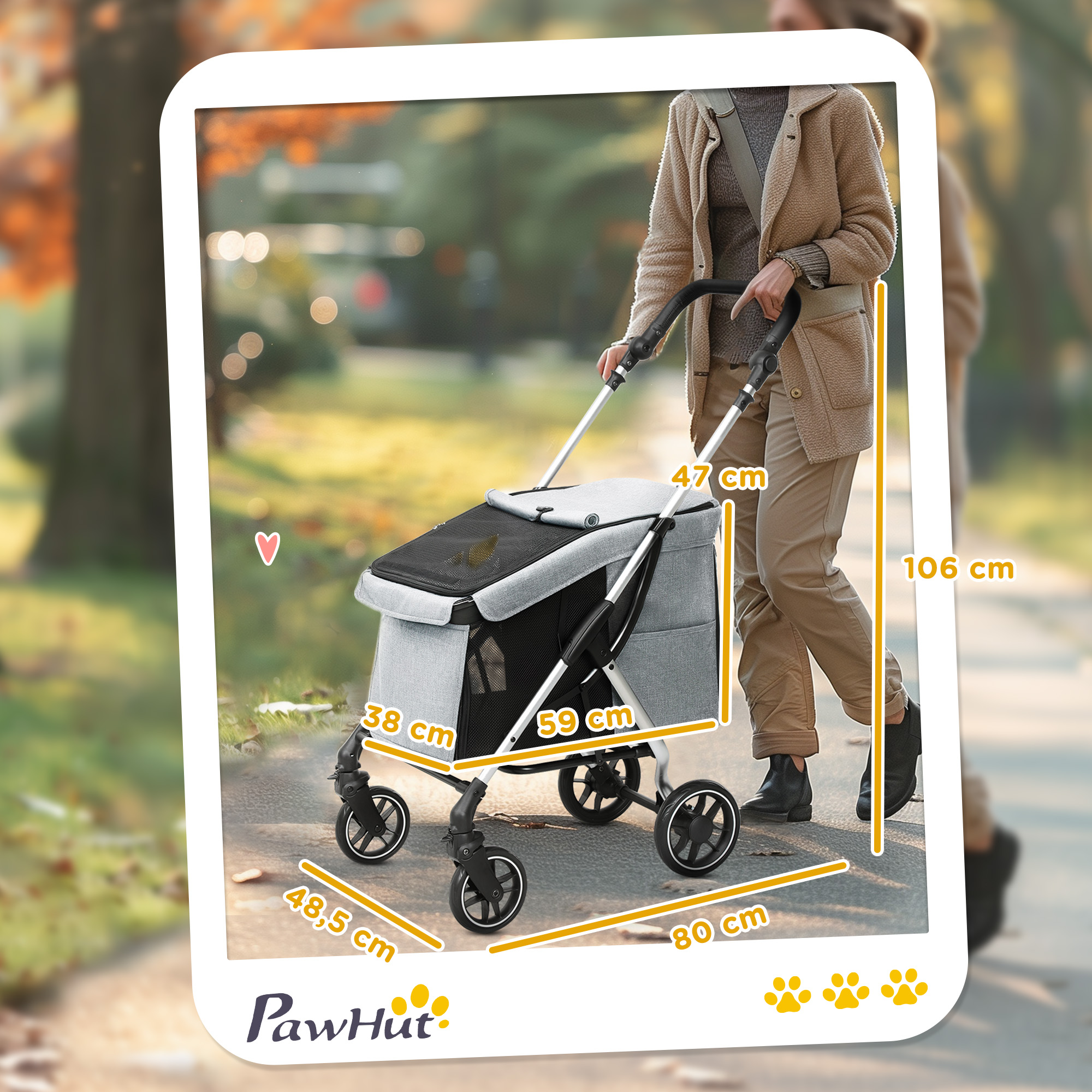 La imagen muestra las dimensiones de un cochecito gris para mascotas con una persona caminando junto a él.