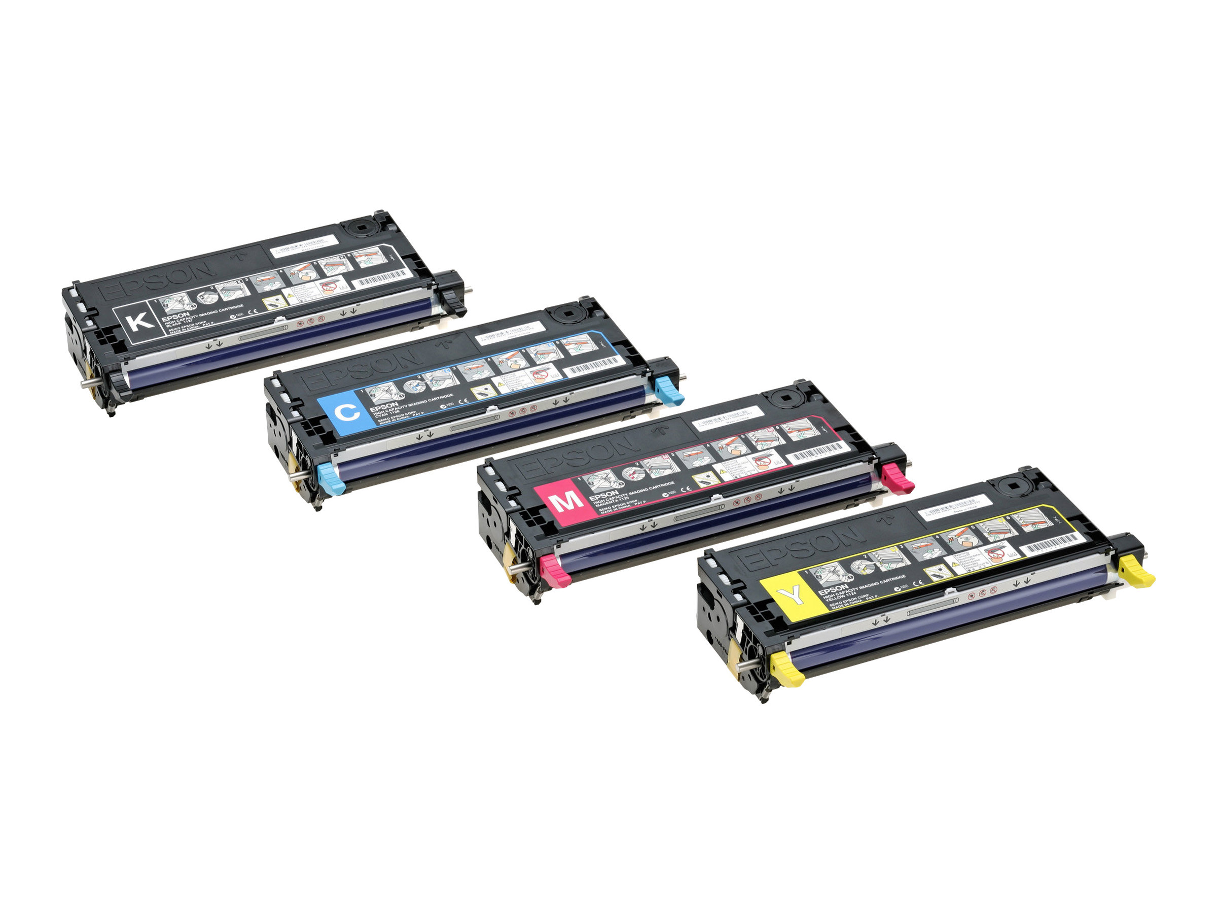 Quattro cartucce d'inchiostro Epson in nero, ciano, magenta e giallo, in diagonale su una superficie bianca.