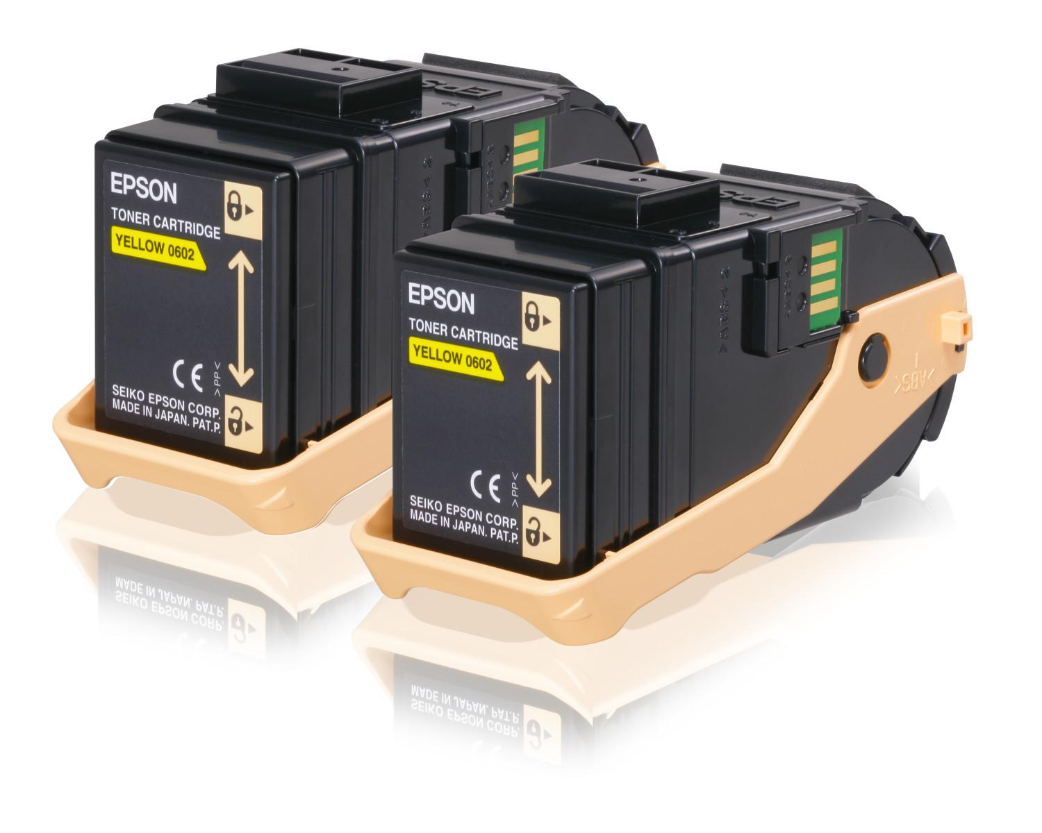 Due cartucce toner Epson nere con l'etichetta 'Giallo 0602', in un vassoio beige, su sfondo bianco.