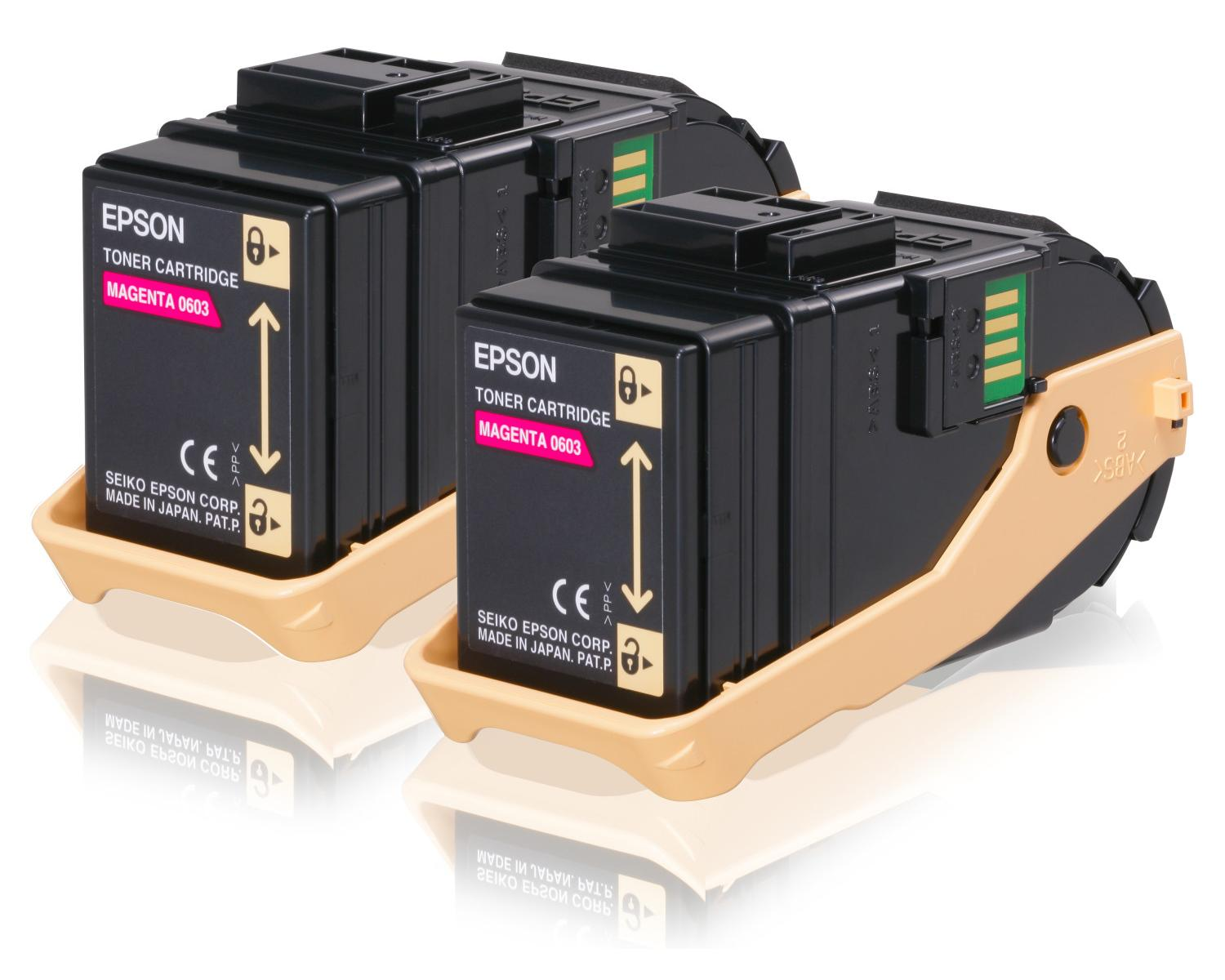 Due cartucce toner Epson nere con l'etichetta 'Magenta 0603', in un vassoio beige, su sfondo bianco.