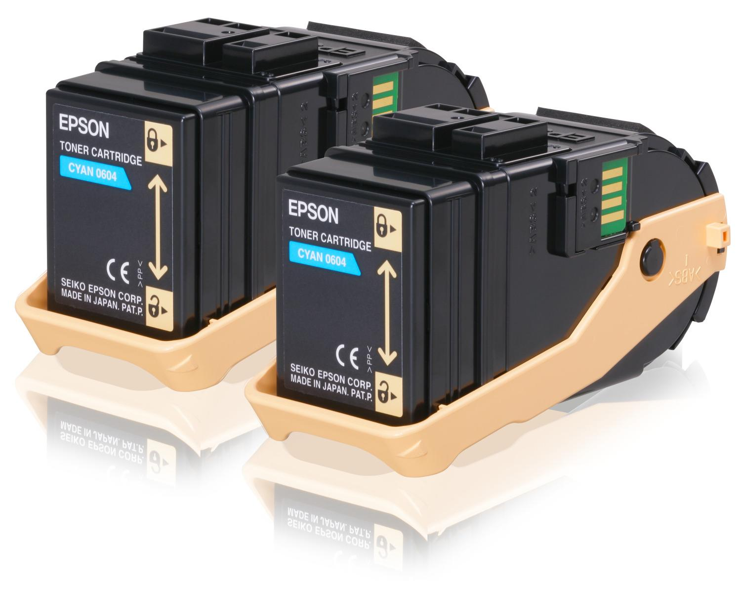Due cartucce toner Epson nere con l'etichetta 'Ciano 0604', in un vassoio beige, su sfondo bianco.