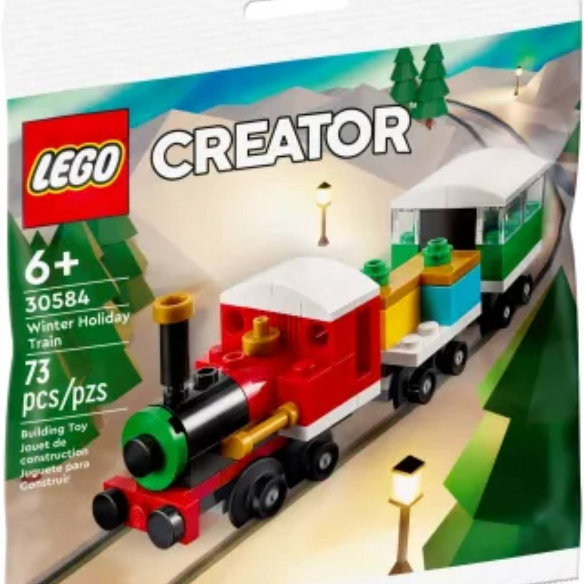 Lego Creator Winter Holiday Train Set in Verpackung, mit rotem Zug, grünem Wagen und Winterszene.