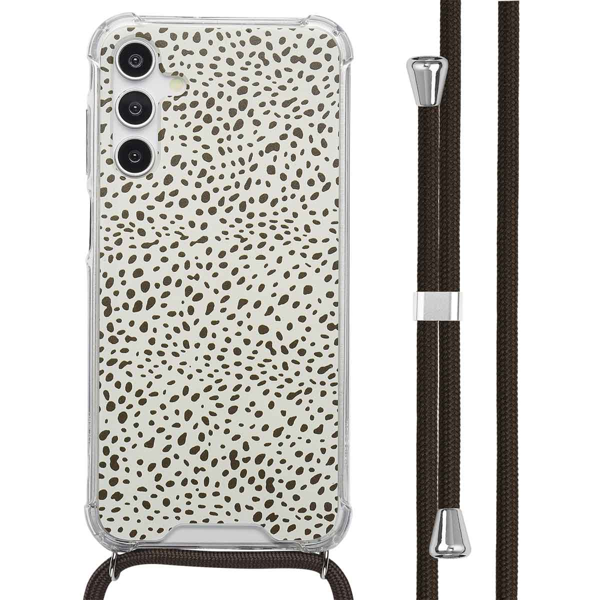 Telefoonhoesje met een stippenpatroon in bruin en wit, met een bruin koord. Transparante hoes.