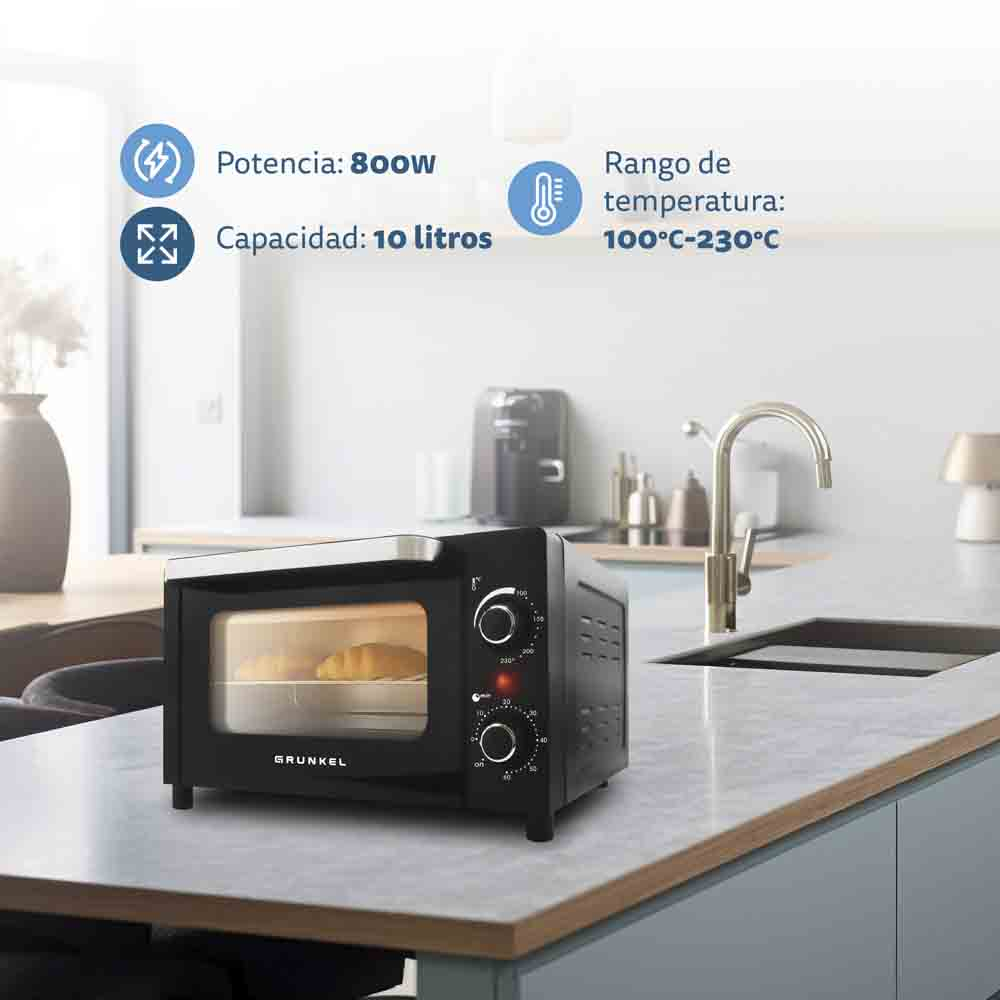 Forno nero con cibo all'interno. Ha quadranti e il marchio 'Grunkel'. Le etichette informative sono a sinistra.