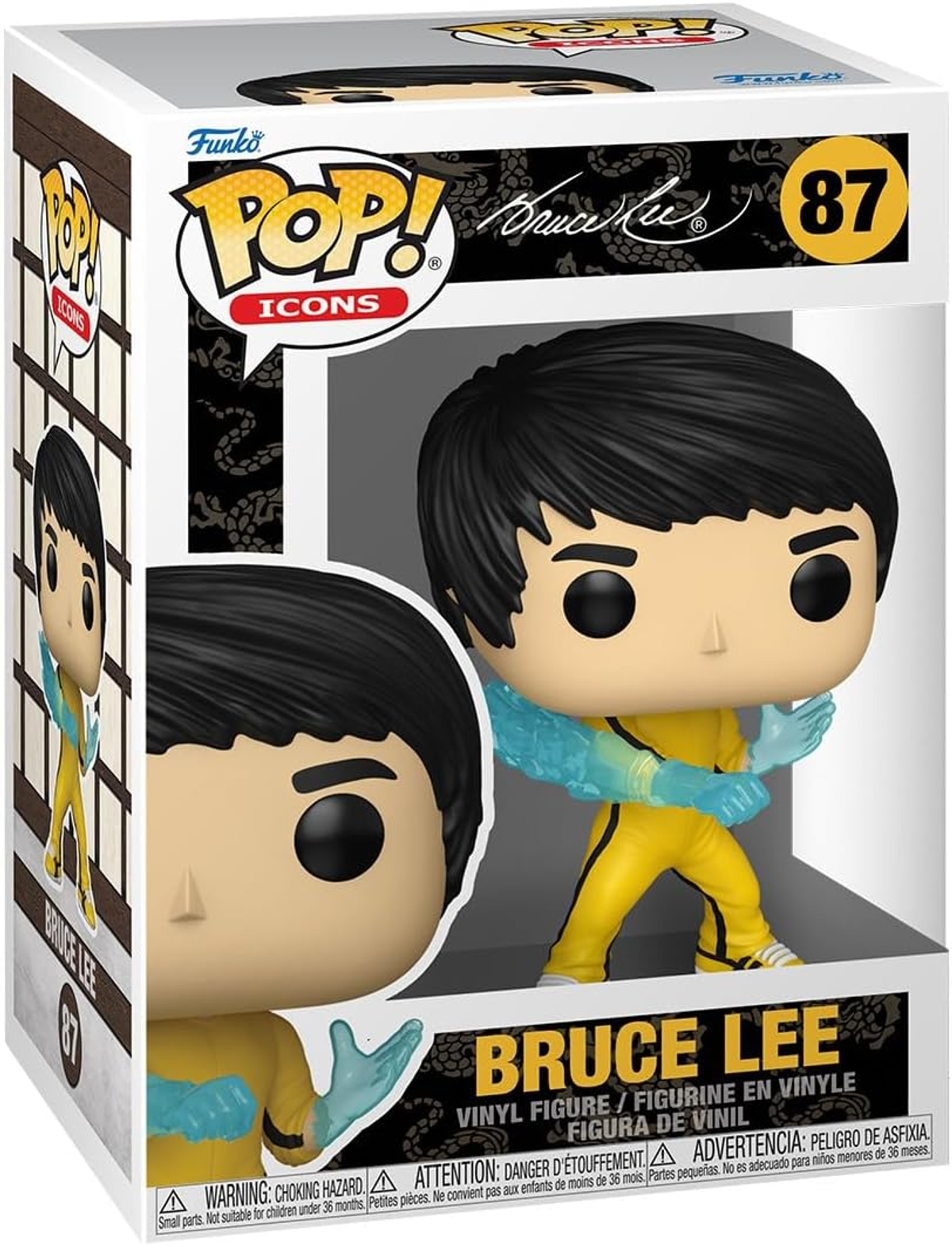 Figurina di Bruce Lee in tuta gialla, braccia aperte, in una scatola espositiva. Design del drago.